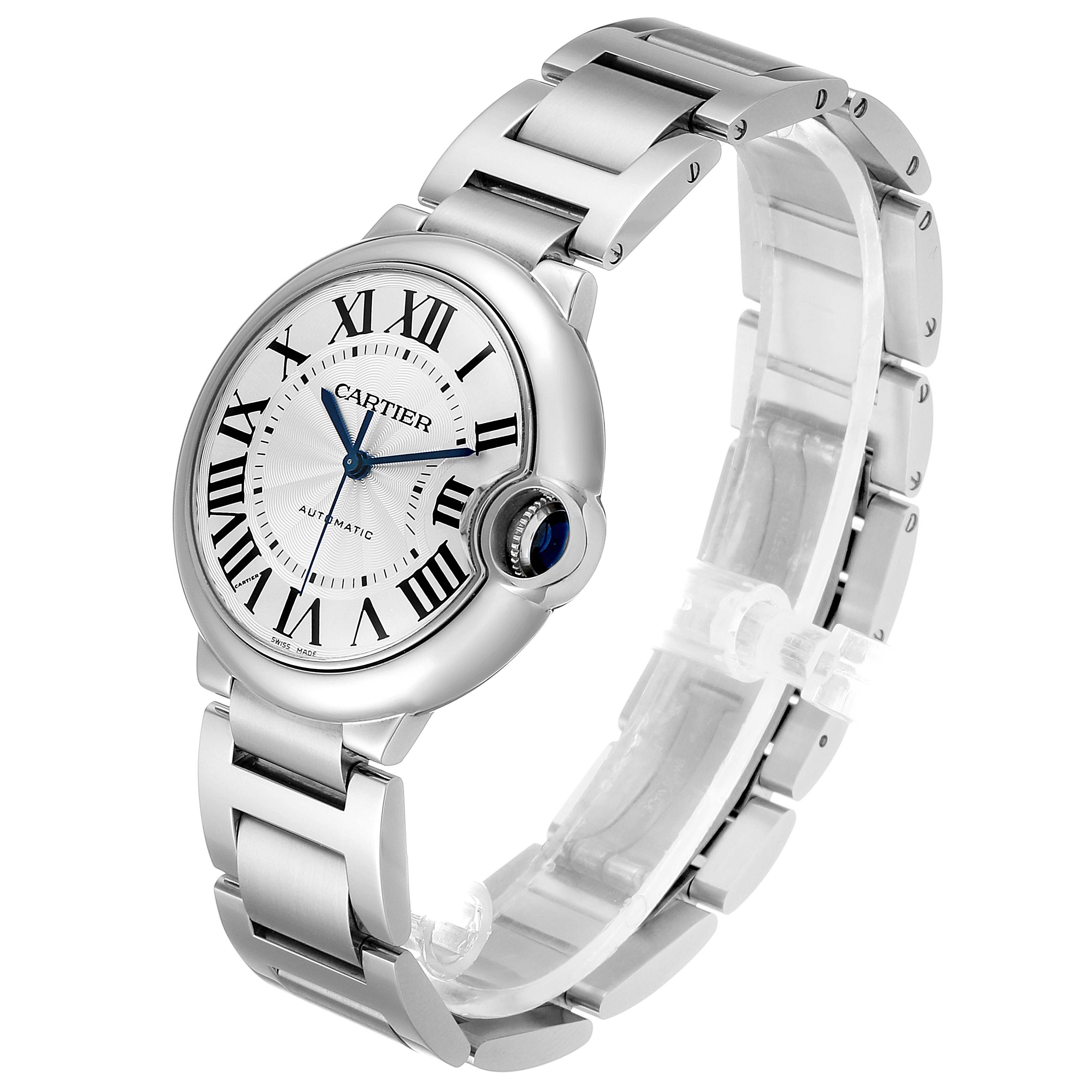 The image shows a Cartier Ballon Bleu W6920046 Women's Stainless Steel Silver Dial W6920046 Women's Stainless Steel Silver Dial watch in a semi-side view, highlighting its face, crown, and metal bracelet.