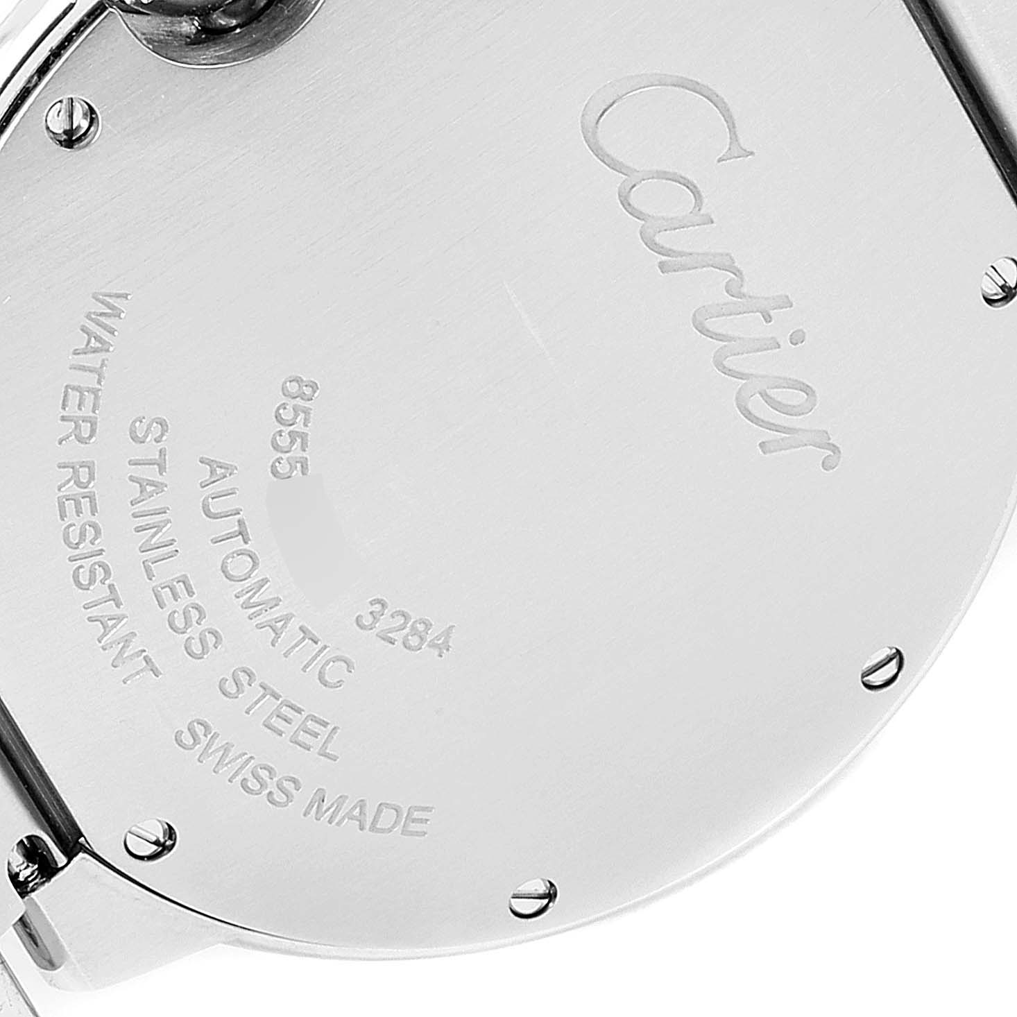 The image shows the back of a Ballon Bleu watch by Cartier, featuring brand engravings and specification details.