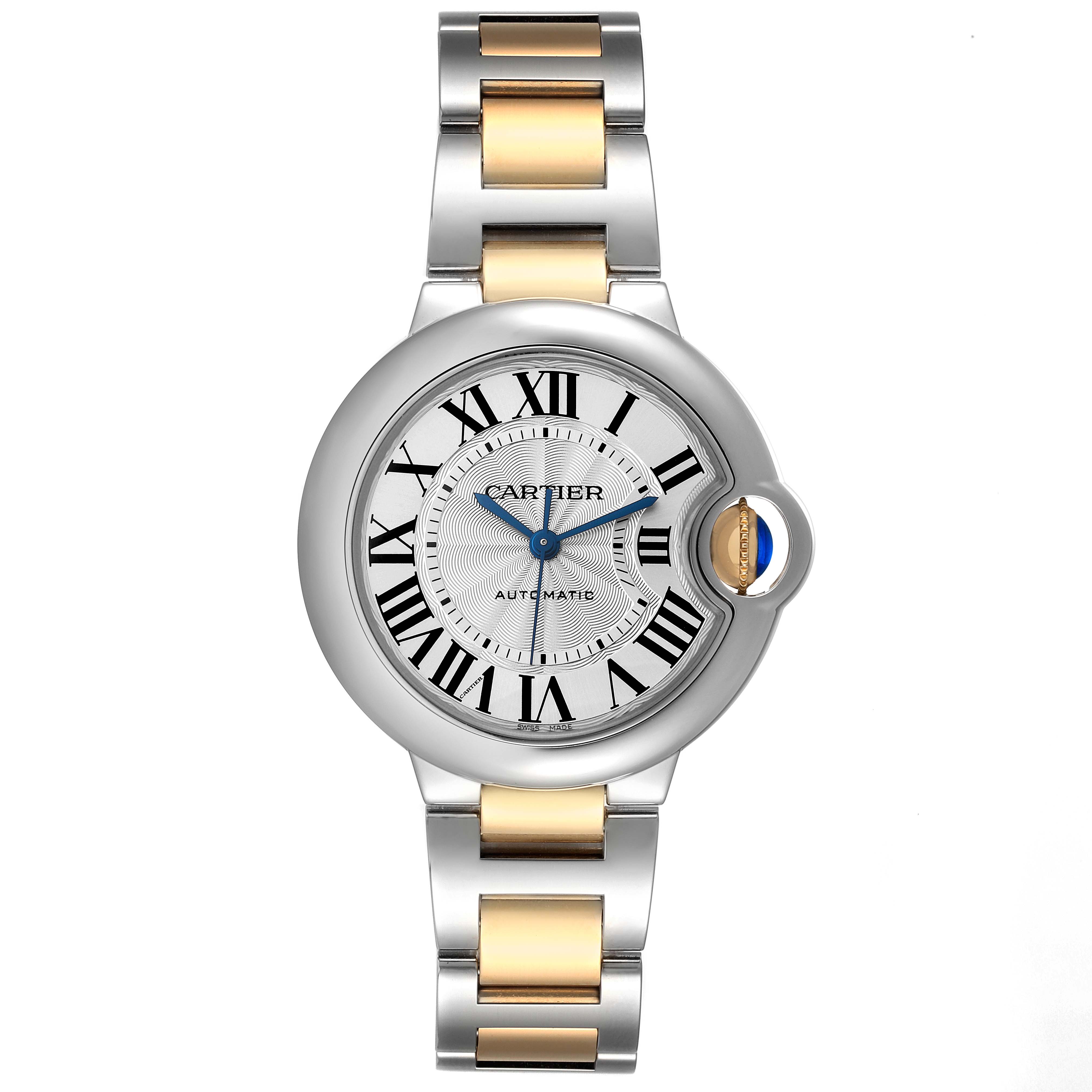 This Cartier Ballon Bleu W2BB0029 Women
s Steel and Gold (two tone) Silver Dial W2BB0029 Women
s Steel and Gold (two tone) Silver Dial watch is shown from the front, highlighting its face, hands, and two-tone metal bracelet.
