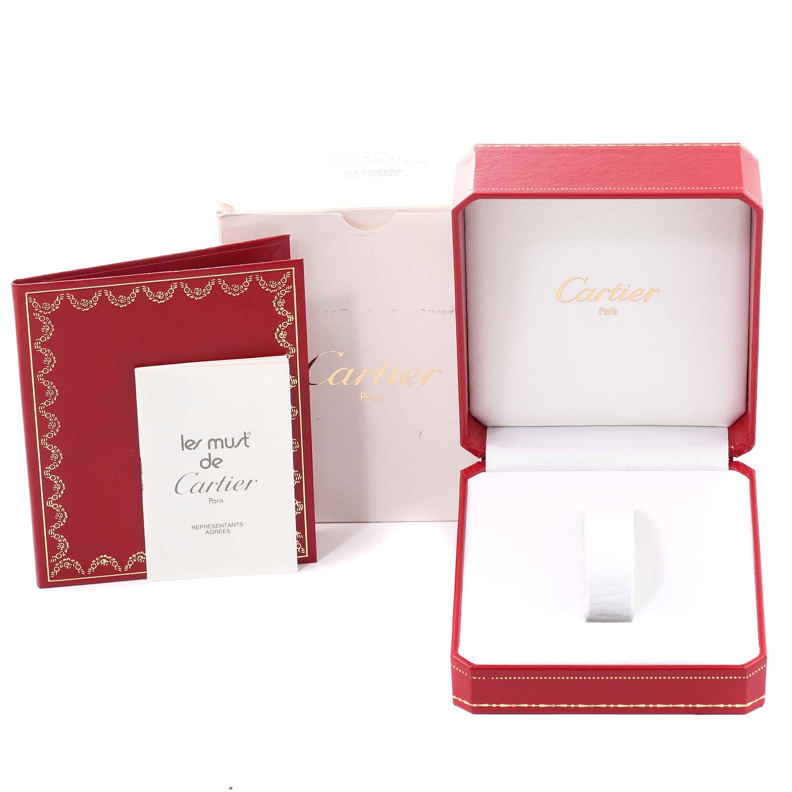 The image shows the packaging and manuals for a Panthere model by Cartier, including a red box, a white inner box, and a booklet.