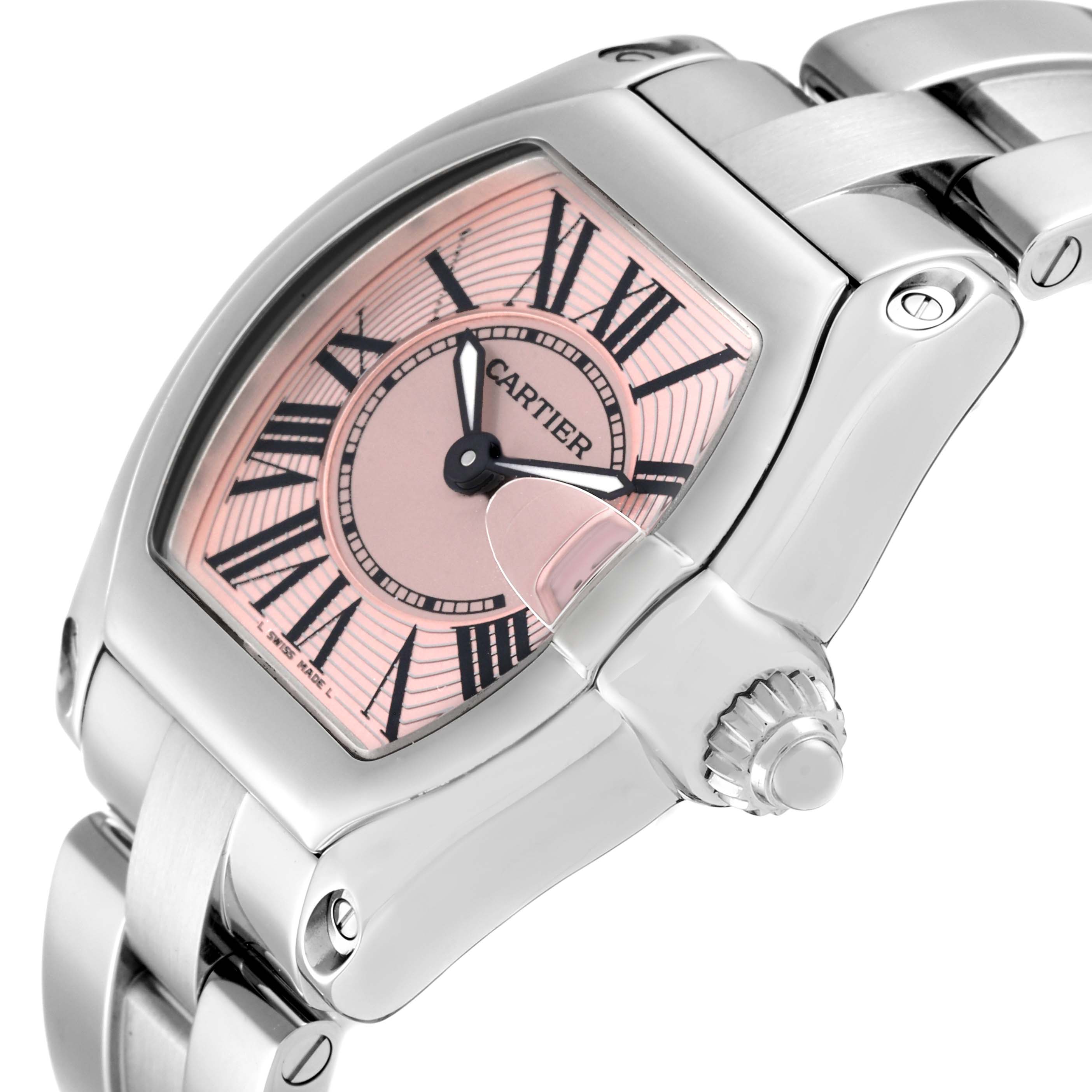 The image shows a close-up, angled view of the Cartier Roadster W62017V3 Women's Stainless Steel Pink Dial W62017V3 Women's Stainless Steel Pink Dial watch, highlighting the dial, body, and part of the bracelet.