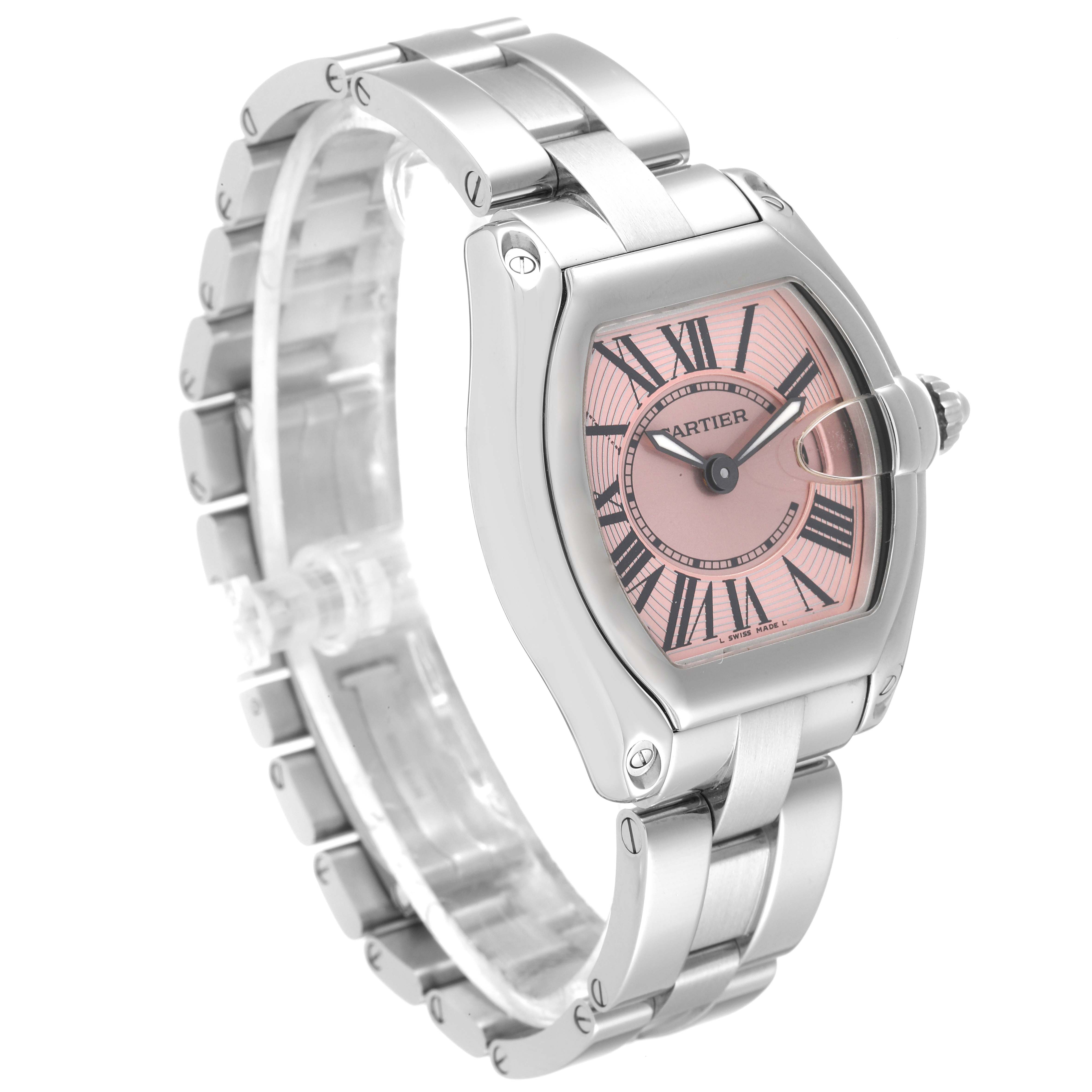 The image shows a three-quarter view of a Cartier Roadster W62017V3 Women's Stainless Steel Pink Dial W62017V3 Women's Stainless Steel Pink Dial watch, highlighting its face, bezel, and metal bracelet.