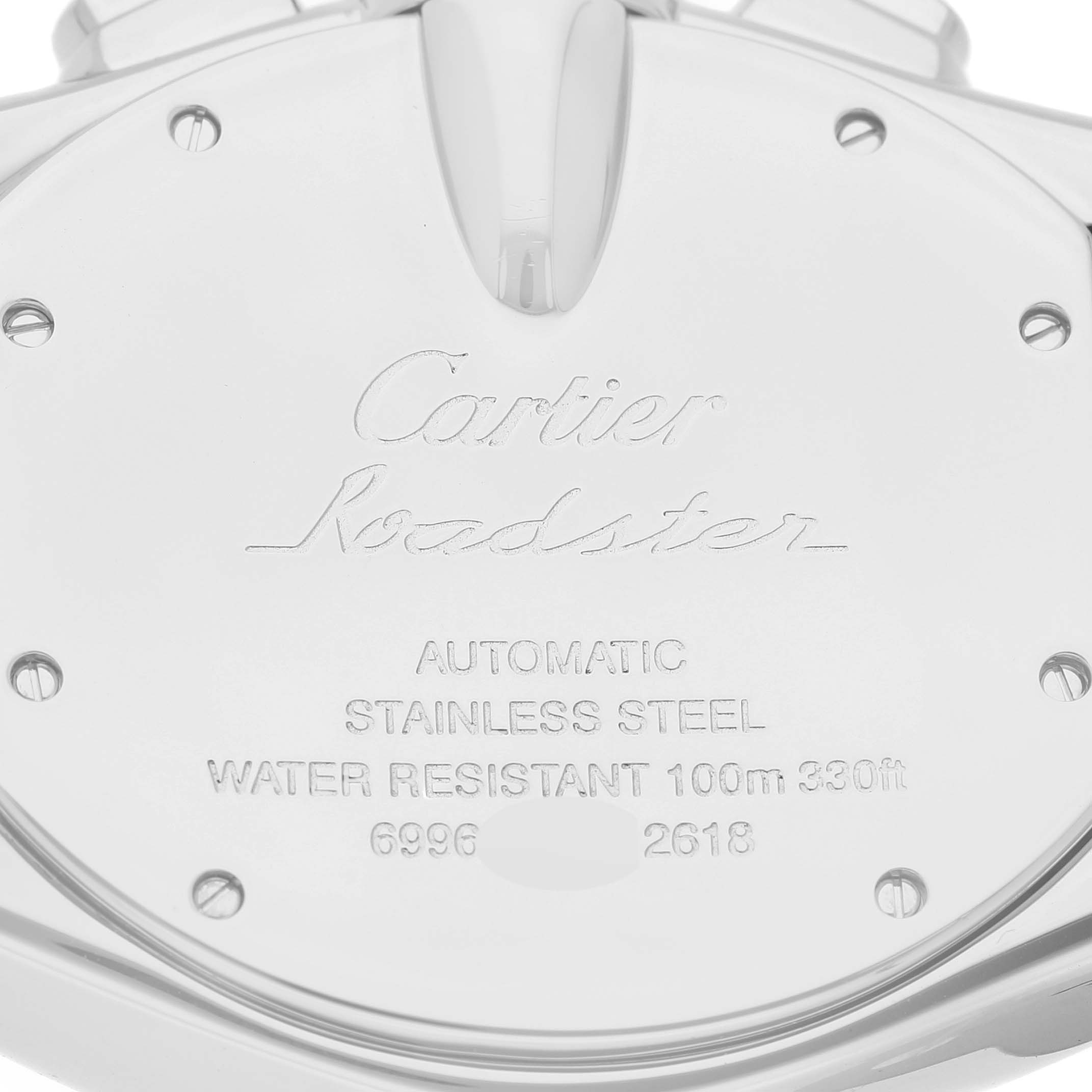 The image shows the back case of a Cartier Roadster W62020X6 Men's Stainless Steel Black Dial W62020X6 Men's Stainless Steel Black Dial watch, displaying its specifications and engravings.