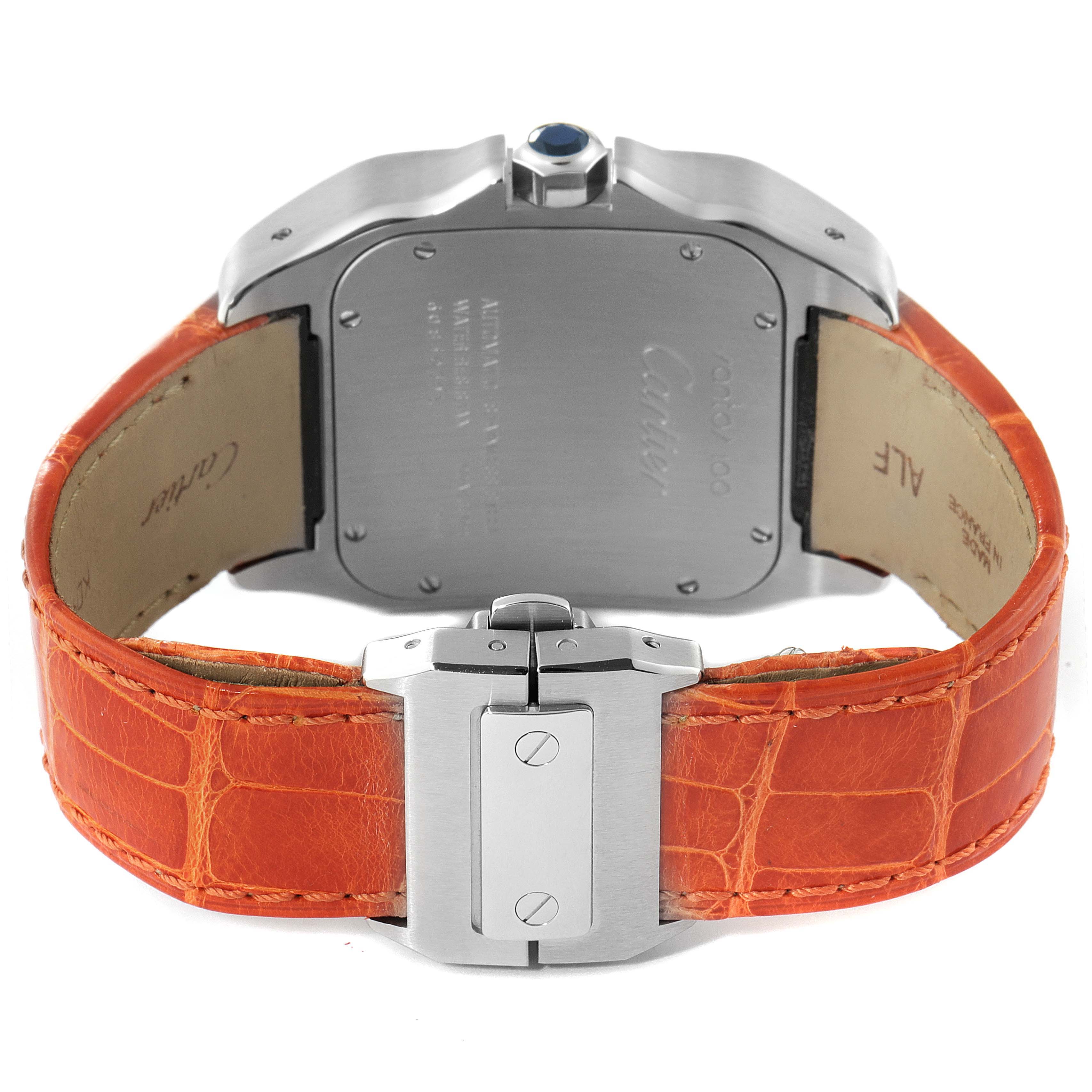 The image shows the back view of a Cartier Santos W20073X8 Men's Stainless Steel Silver Dial W20073X8 Men's Stainless Steel Silver Dial watch, focusing on its case back and orange leather strap with a deployment clasp.