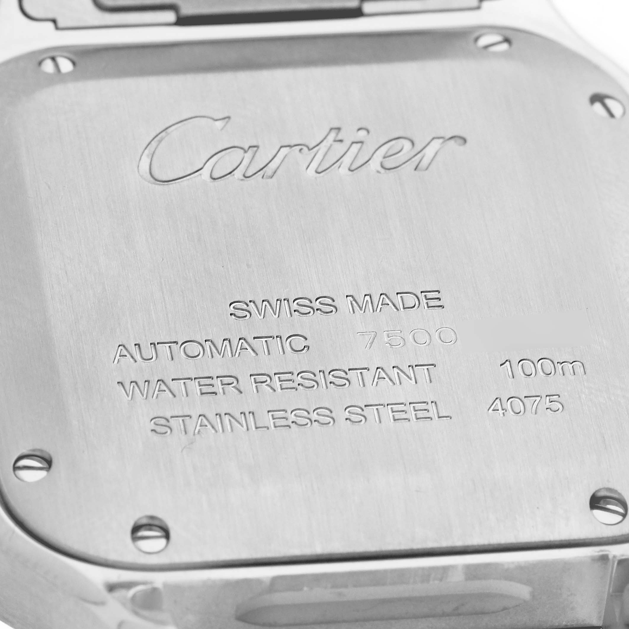 The image shows the back case of a Cartier Santos W2SA0007 Men's Steel and Gold (two tone) Silver Dial W2SA0007 Men's Steel and Gold (two tone) Silver Dial watch, displaying branding and specifications.