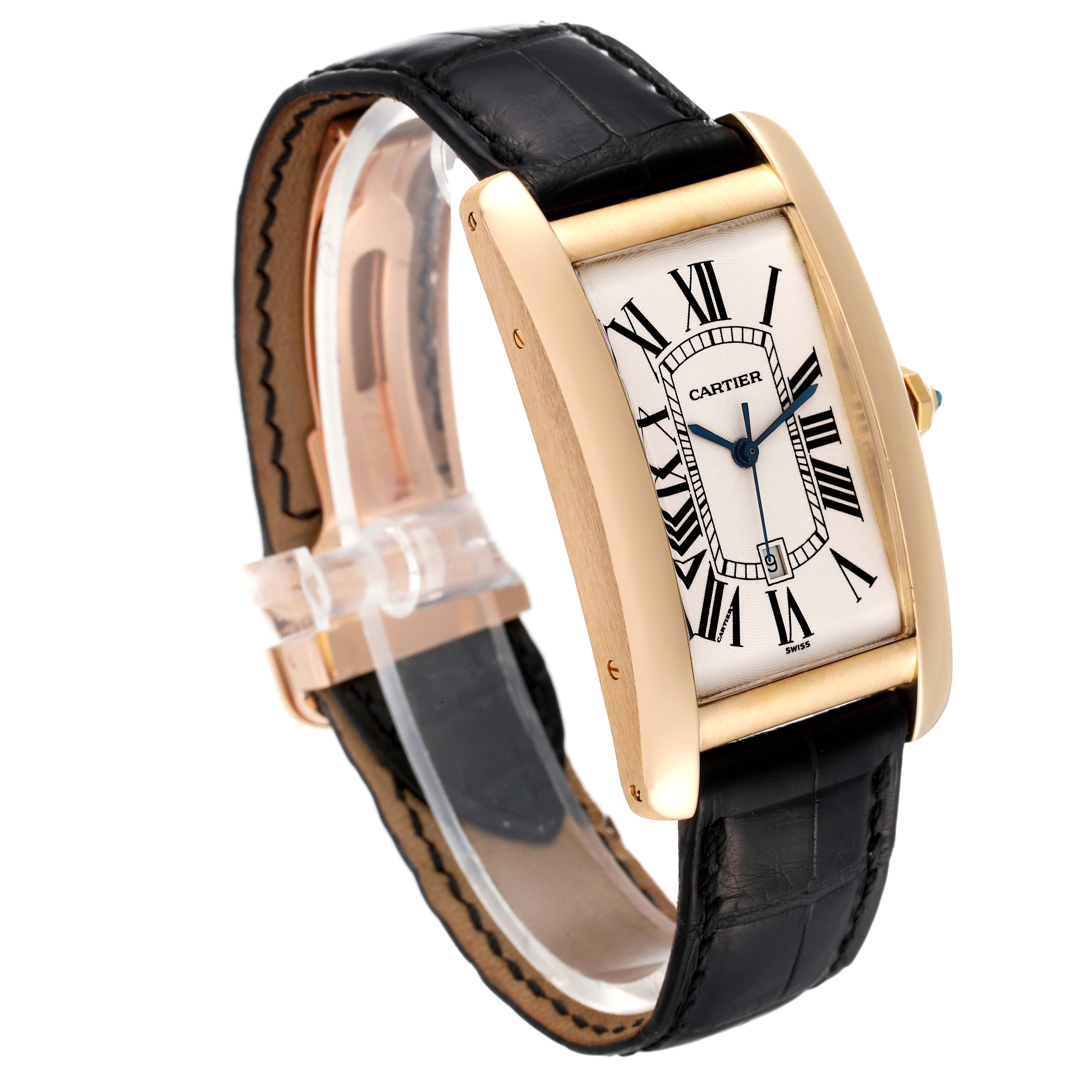 The image shows a Cartier Tank Americaine W2603156 Men
s Yellow Gold Silver Dial W2603156 Men
s Yellow Gold Silver Dial watch at a 3/4 angle, highlighting its face, strap, and clasp.