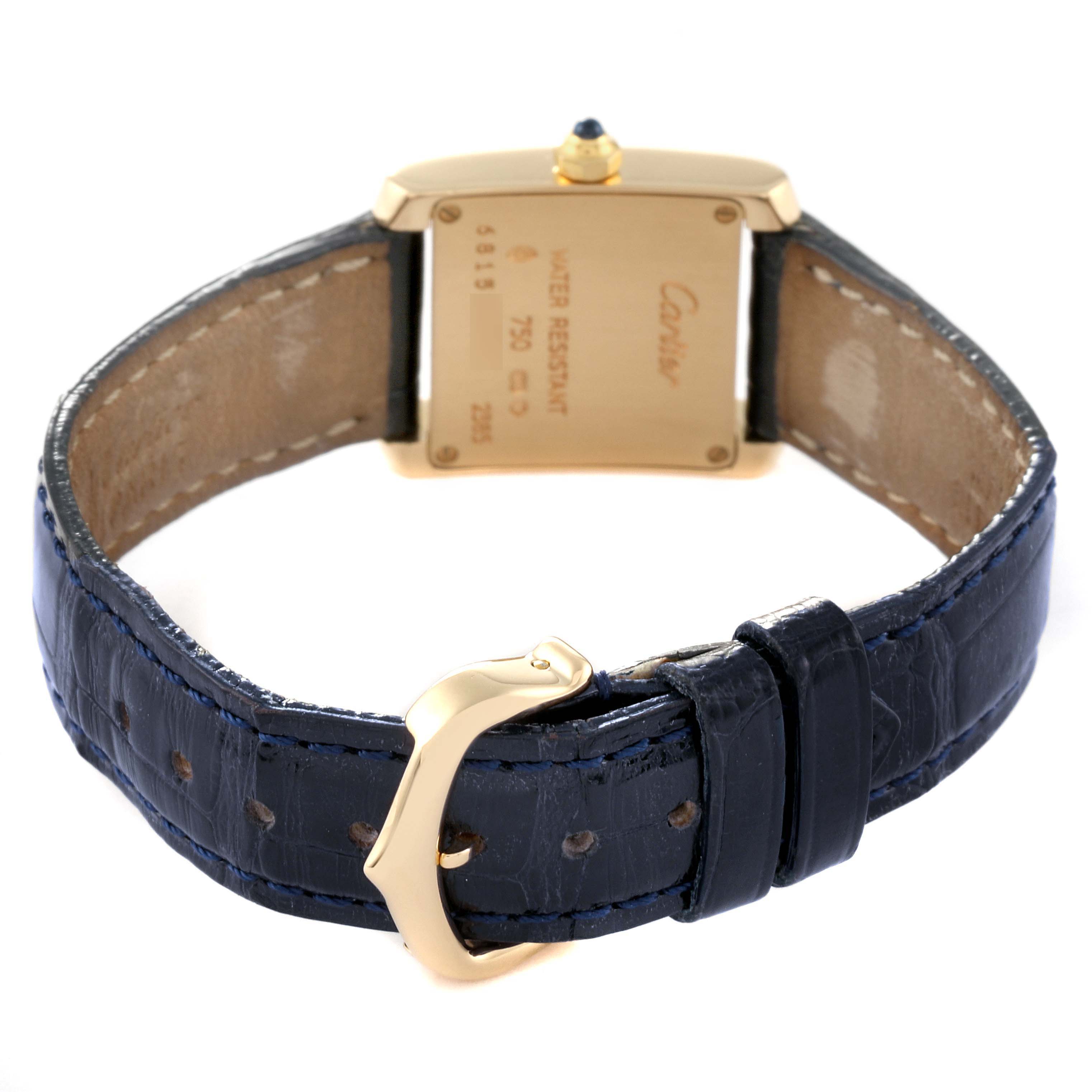 The image shows the back view of a Cartier Tank Francaise W5000256 Women
s Yellow Gold Silver Dial W5000256 Women
s Yellow Gold Silver Dial watch, highlighting its clasp and leather strap.