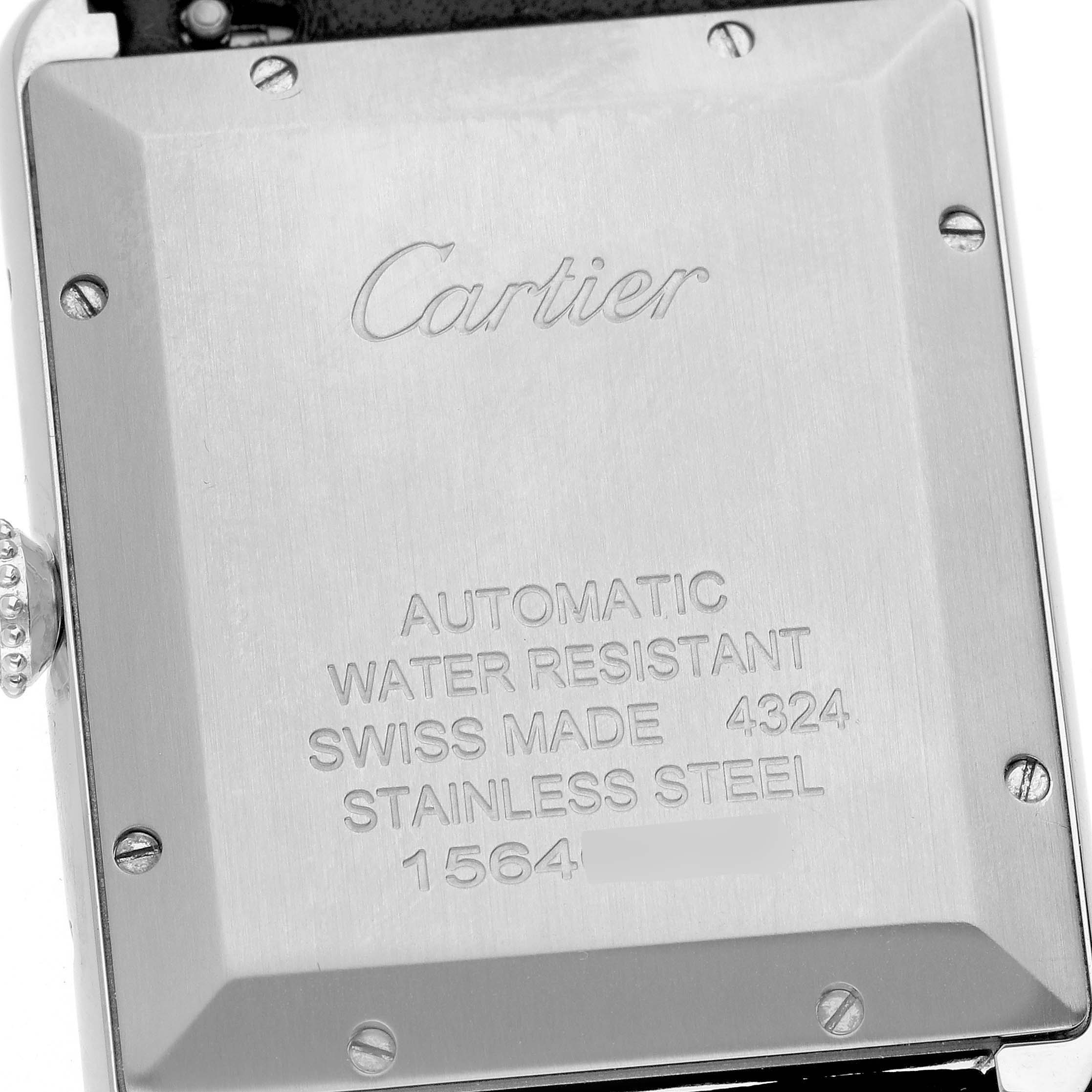 The image shows the back case of a Cartier Tank Must WSTA0040 Men's Stainless Steel Silver Dial WSTA0040 Men's Stainless Steel Silver Dial watch, including brand engraving and specifications.