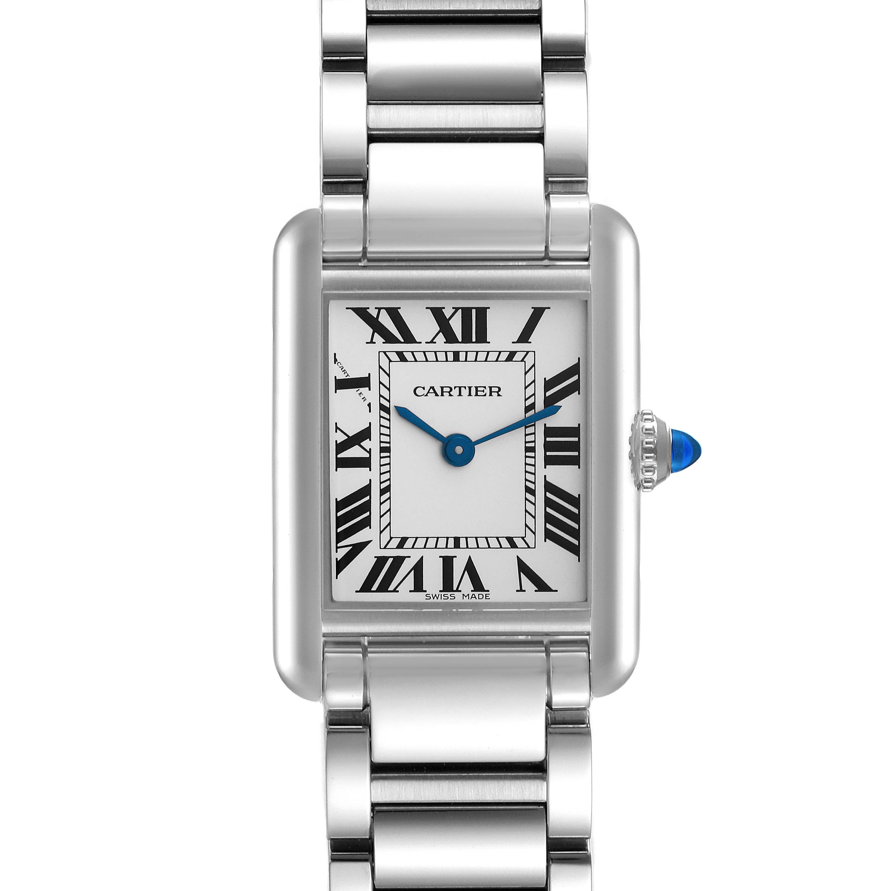 This image shows a close-up, front view of the Tank Must model watch by Cartier, displaying its rectangular face, Roman numerals, and metal bracelet.