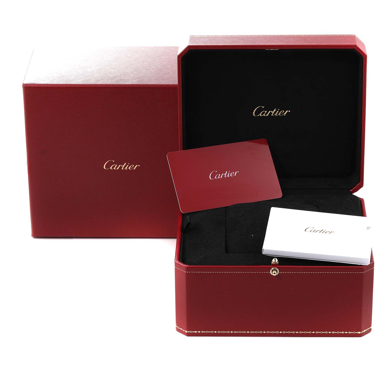 This image shows the packaging and accessories for the Cartier Tank Must WSTA0051 Women
s Stainless Steel Silver Dial WSTA0051 Women
s Stainless Steel Silver Dial watch, including a box, manual, and warranty card.