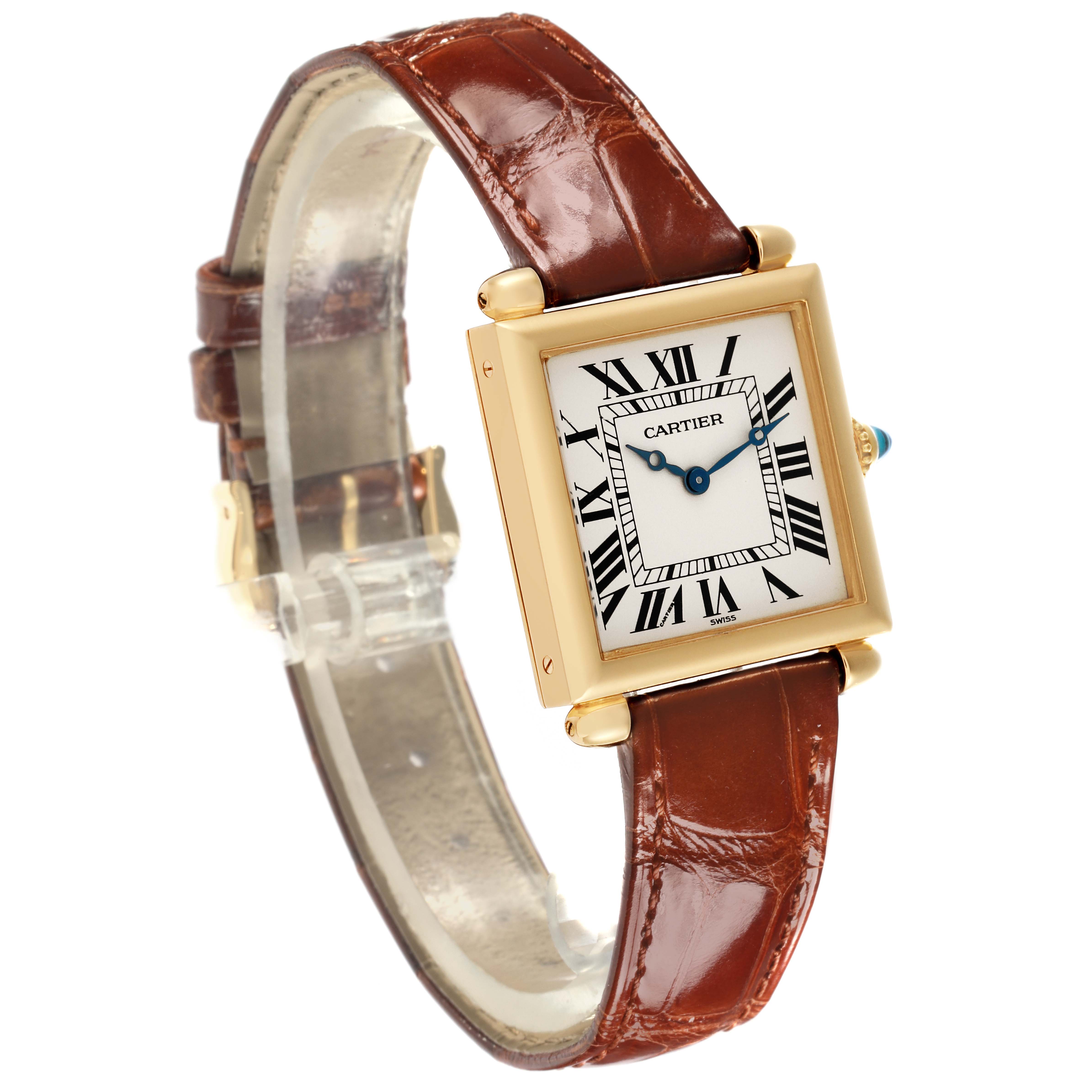 The Cartier Tank Obus W1512256 Women
s Yellow Gold Silver Dial W1512256 Women
s Yellow Gold Silver Dial watch is shown at an angled view, displaying the face, gold case, and brown leather strap.