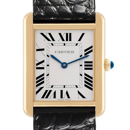 The Cartier Tank Solo watch is shown from the front, highlighting the dial, case, and part of the leather strap.