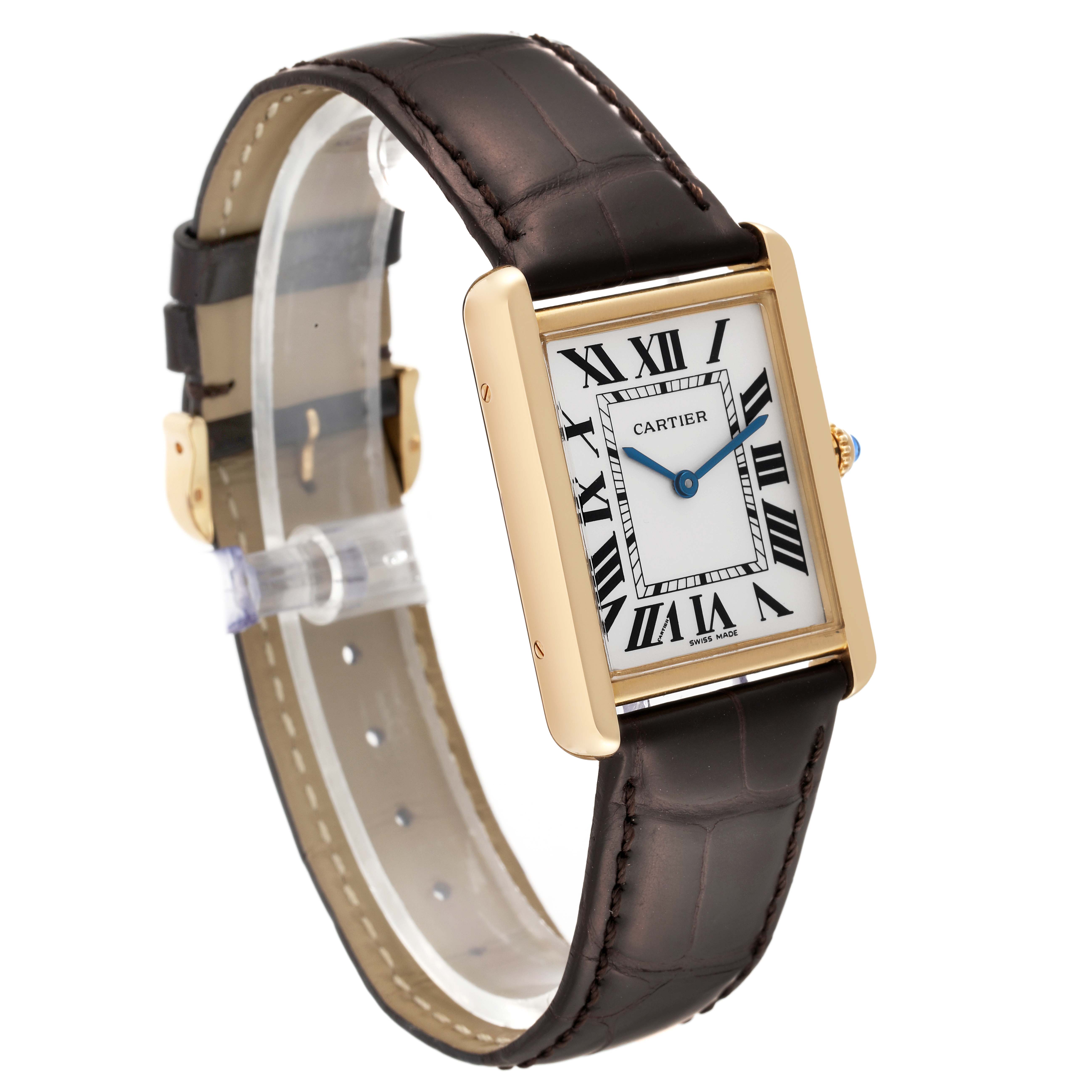 The Cartier Tank Solo W5200004 Men's Steel and Gold (two tone) Blue Dial W5200004 Men's Steel and Gold (two tone) Blue Dial watch is shown at an angle displaying its face, leather strap, gold case, and blue cabochon crown.