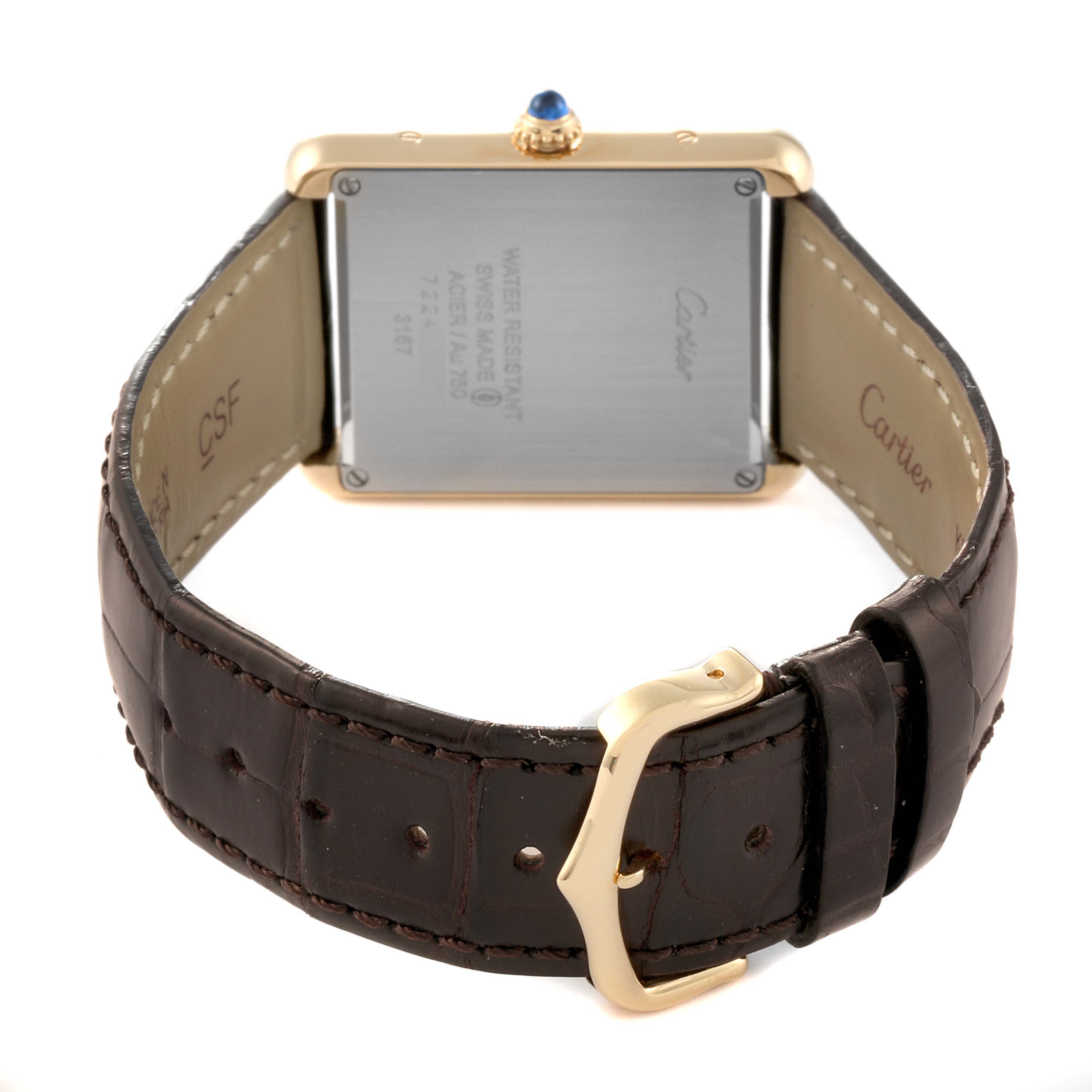 The image shows the back view of a Cartier Tank Solo W5200004 Men's Steel and Gold (two tone) Blue Dial W5200004 Men's Steel and Gold (two tone) Blue Dial watch, featuring the case back and leather strap with a buckle.