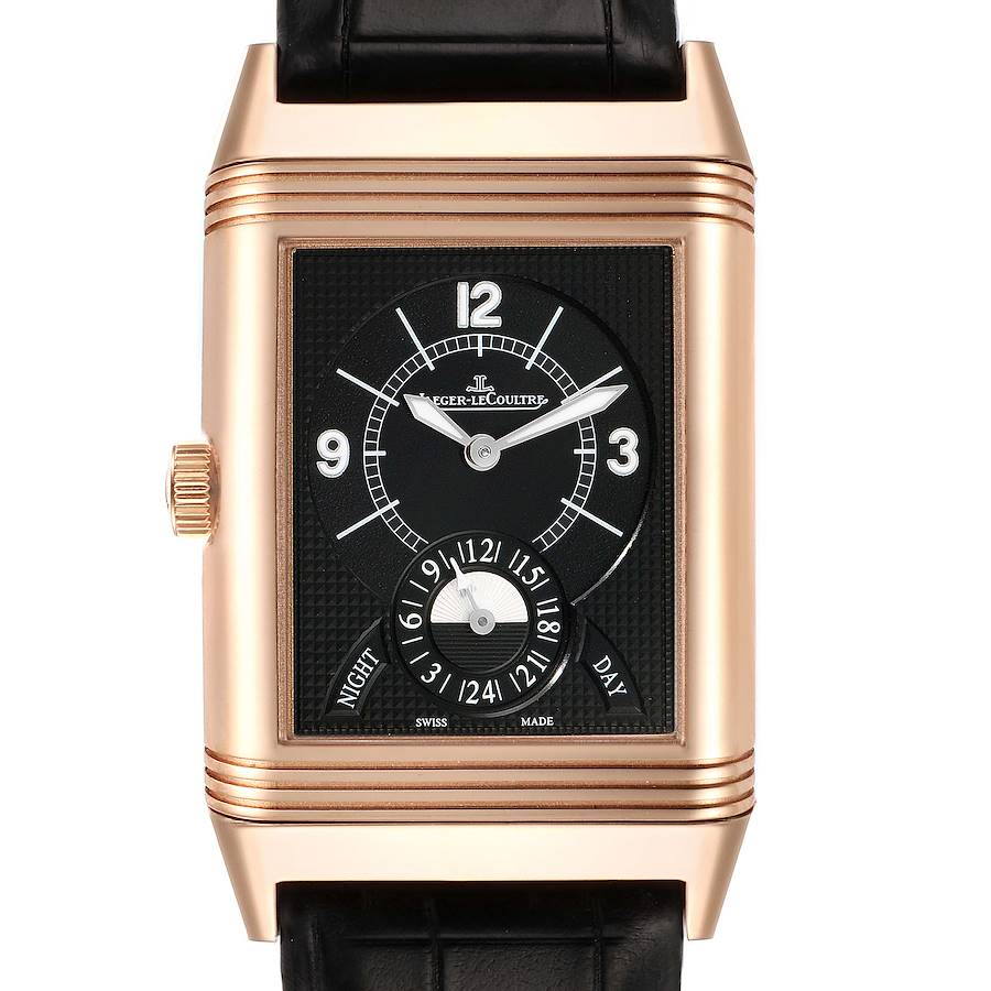 This image shows a frontal view of the Jaeger LeCoultre Reverso watch, highlighting its rectangular case, black dial, and day-night indicator.