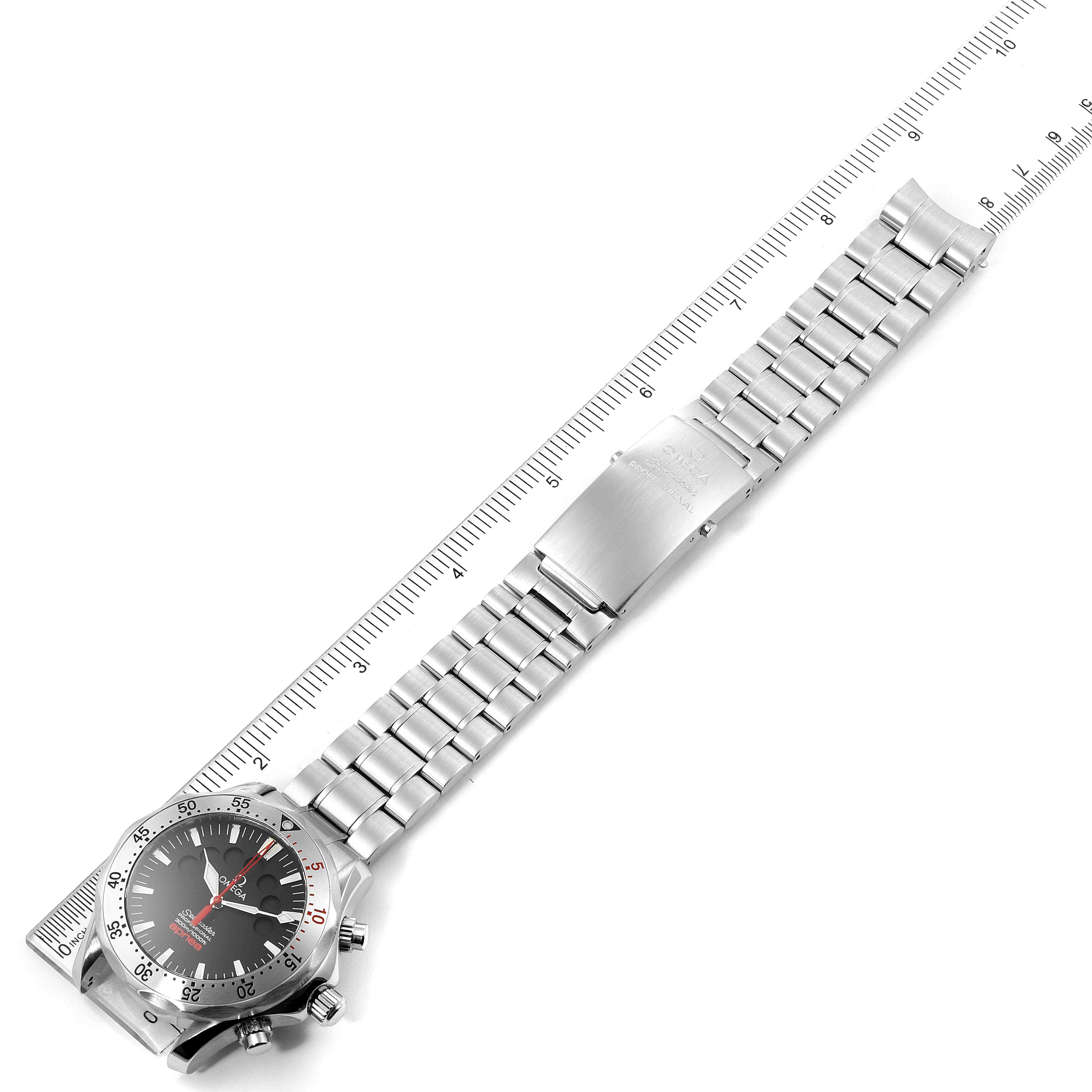 The Omega Seamaster 2595.50.00 Men
s Stainless Steel Black Dial 2595.50.00 Men
s Stainless Steel Black Dial model watch is shown from a top view, displaying its face, bezel, bracelet, and clasp alongside a measurement ruler.