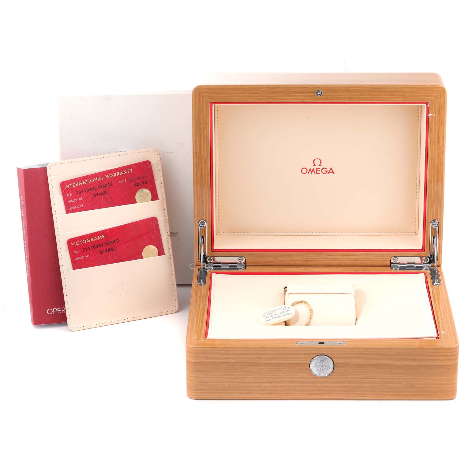 The image shows the packaging and documentation for an Omega Aqua Terra 231.10.39.21.03.002 Men's Stainless Steel Blue Dial 231.10.39.21.03.002 Men's Stainless Steel Blue Dial watch, including the box, warranty cards, and pictograms.