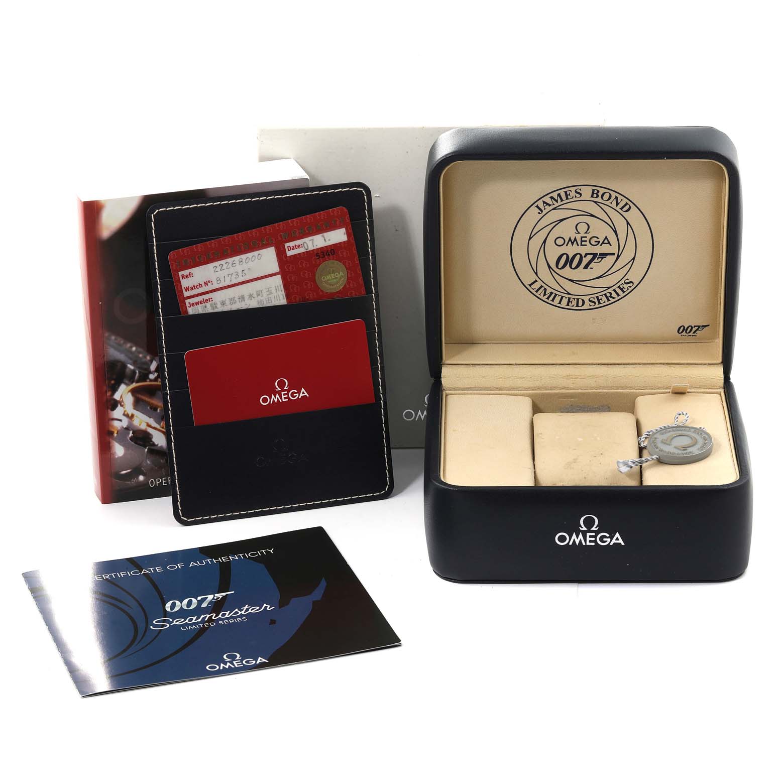 The image shows the packaging and accessories for an Omega Seamaster 2226.80.00 Men's Stainless Steel Blue Dial 2226.80.00 Men's Stainless Steel Blue Dial, including the box, card case, cards, and a certificate of authenticity.
