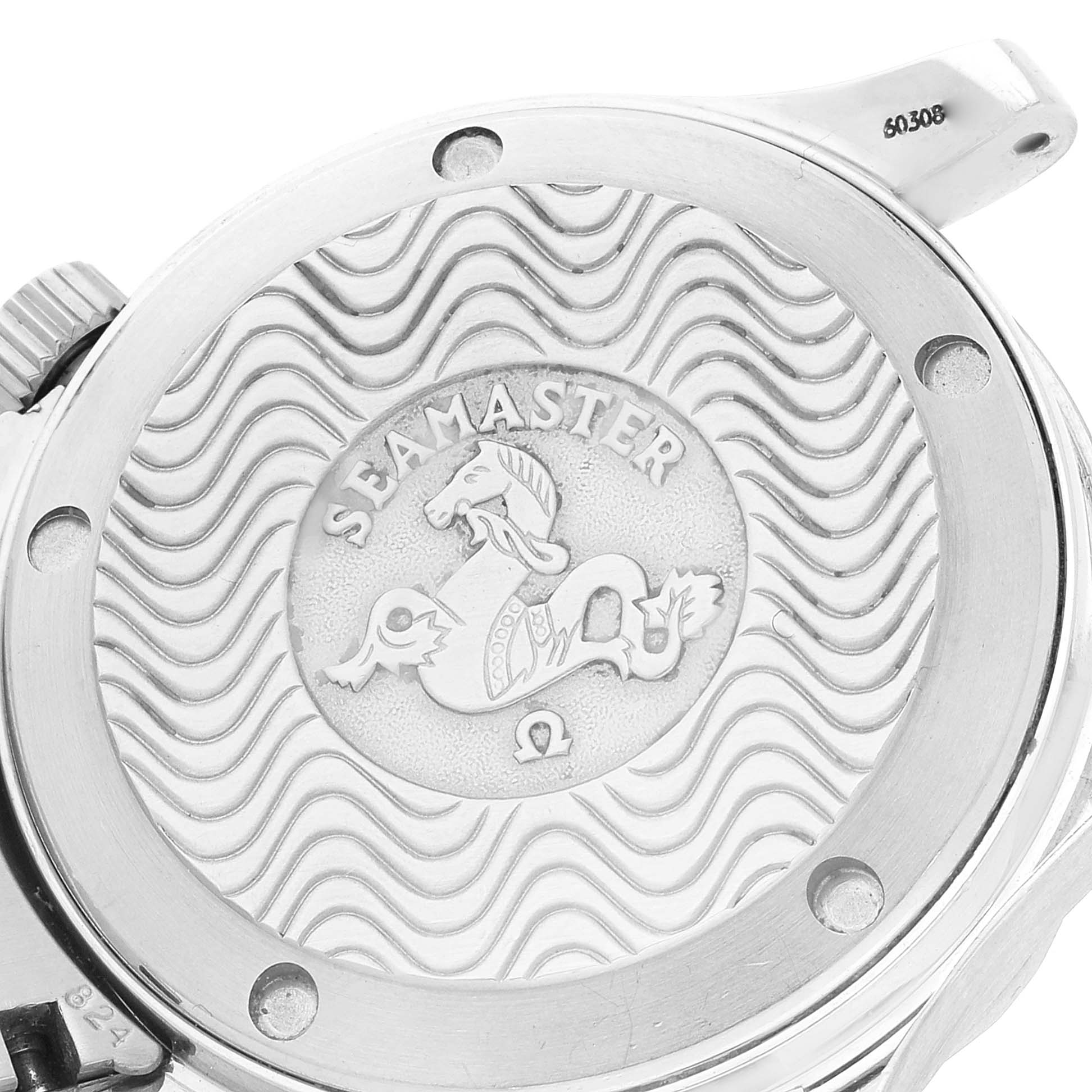 The image shows the back case of an Omega Seamaster 2551.80.00 Men's Stainless Steel Blue Dial 2551.80.00 Men's Stainless Steel Blue Dial watch, highlighting its engraving and wave pattern.