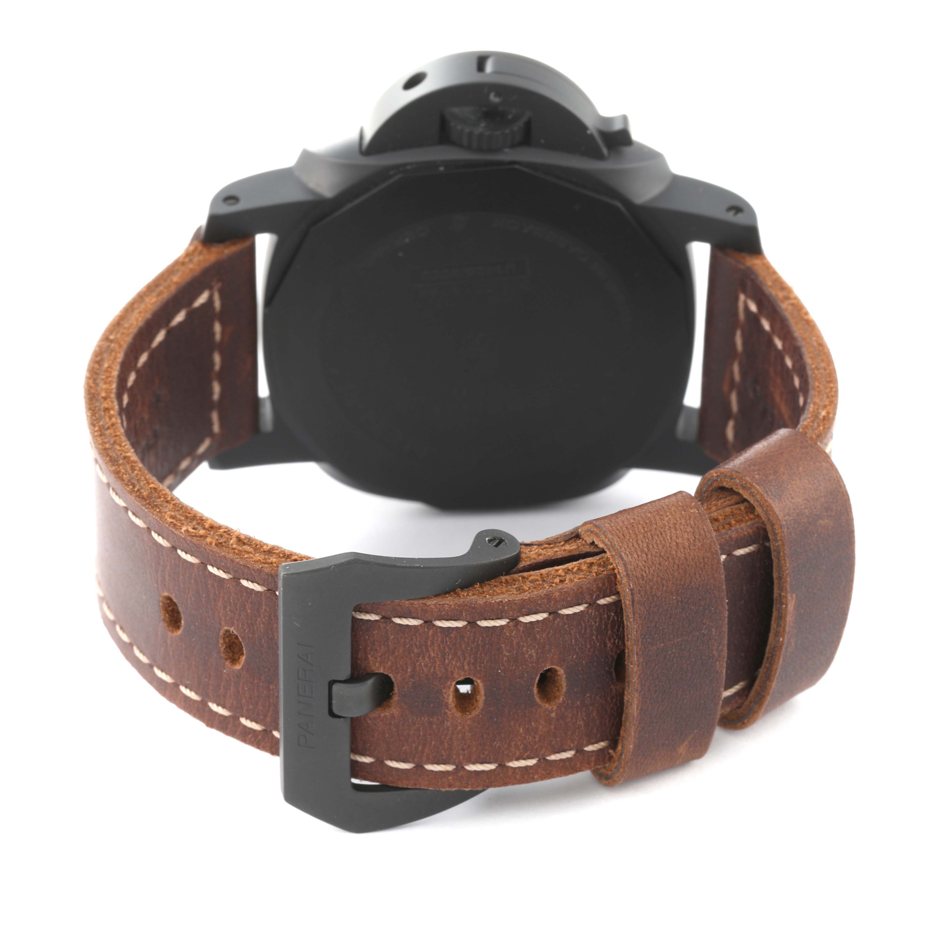 The image shows the back of a Panerai Luminor PAM01441 Men's Ceramic Black Dial PAM01441 Men's Ceramic Black Dial watch and its brown leather strap with a buckle.