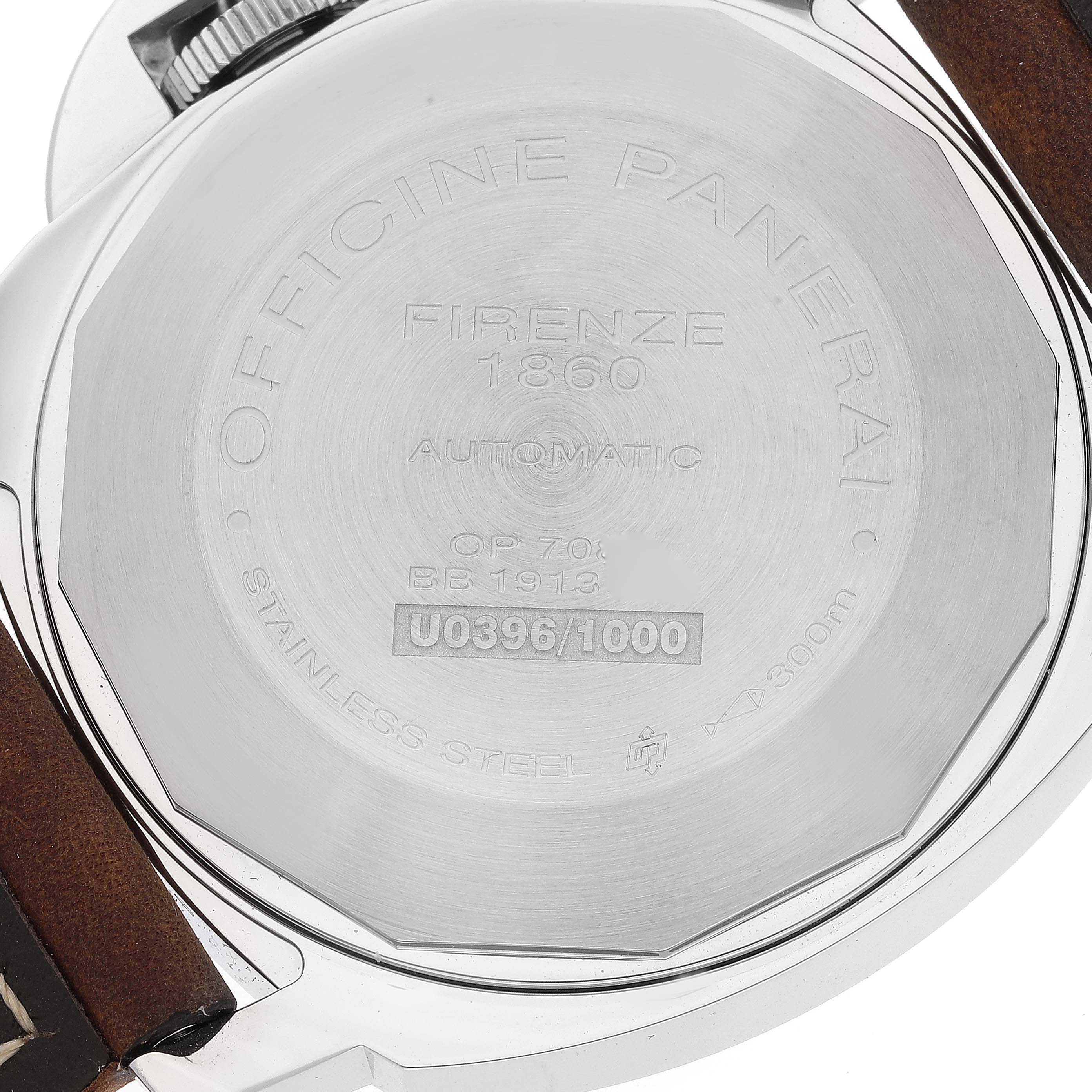 This image shows the back case of a Panerai Luminor PAM01088 Men
s Stainless Steel Black Dial PAM01088 Men
s Stainless Steel Black Dial watch, detailing inscriptions and the leather strap.