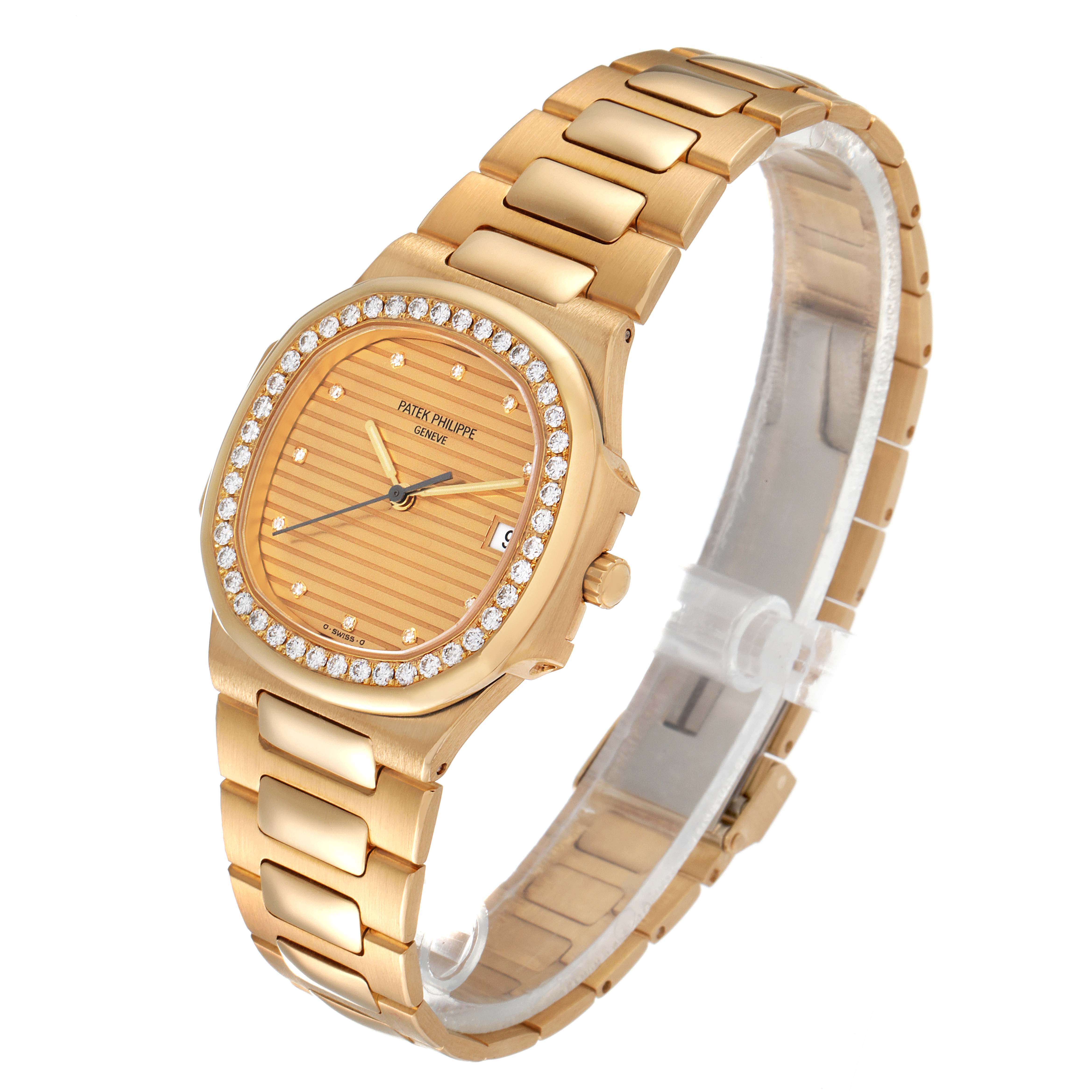This image shows a Patek Philippe Nautilus 3900/003 Women's Yellow Gold Champagne Dial 3900/003 Women's Yellow Gold Champagne Dial watch at a three-quarter angle, highlighting the gold bracelet and diamond-set bezel.