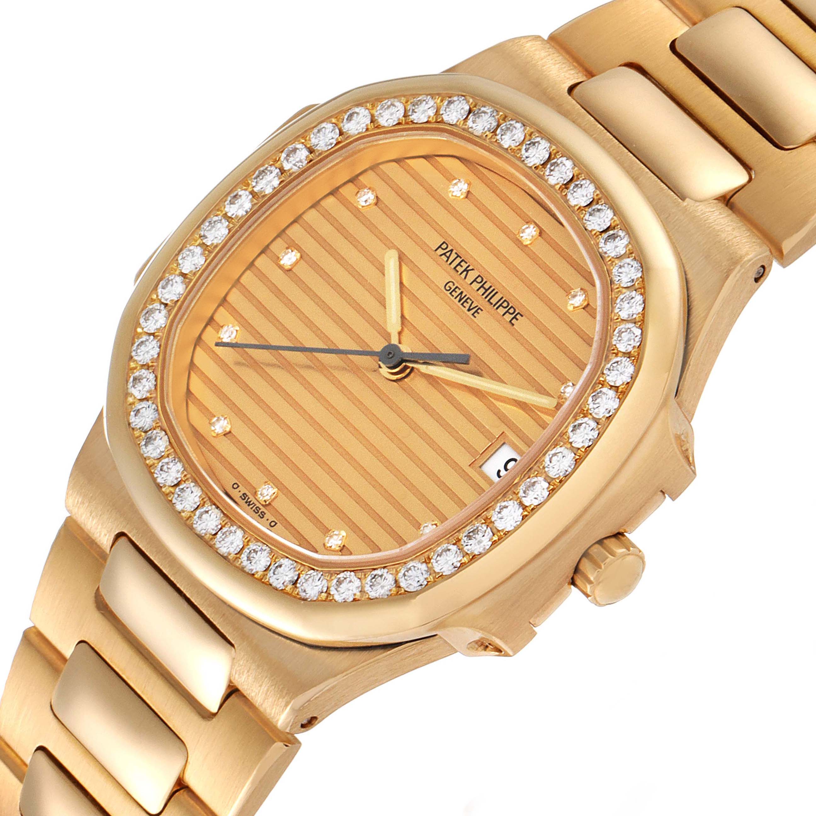 The image shows a close-up of the Patek Philippe Nautilus 3900/003 Women's Yellow Gold Champagne Dial 3900/003 Women's Yellow Gold Champagne Dial watch from an angled top view, highlighting the face, bezel, and bracelet.