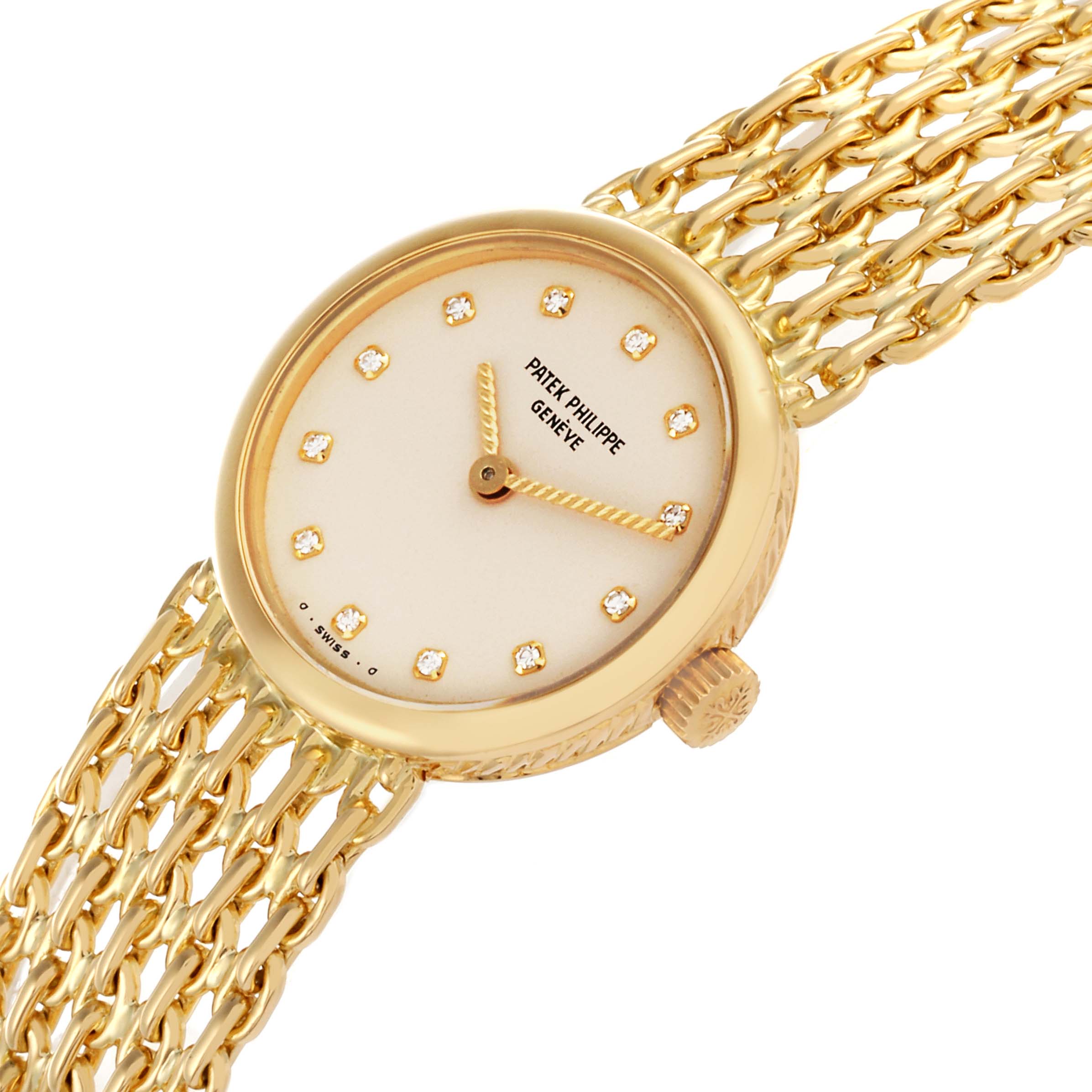 The Vintage Patek Philippe watch is shown at an angle highlighting the face, crown, and part of the gold bracelet.