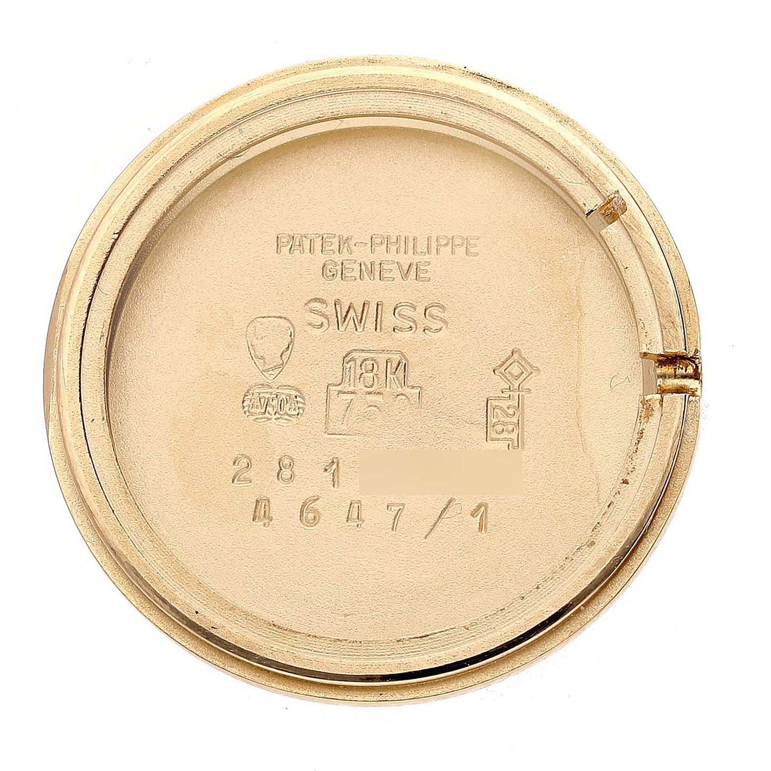 The image shows the inside case back of a Vintage Patek Philippe watch, featuring engravings.