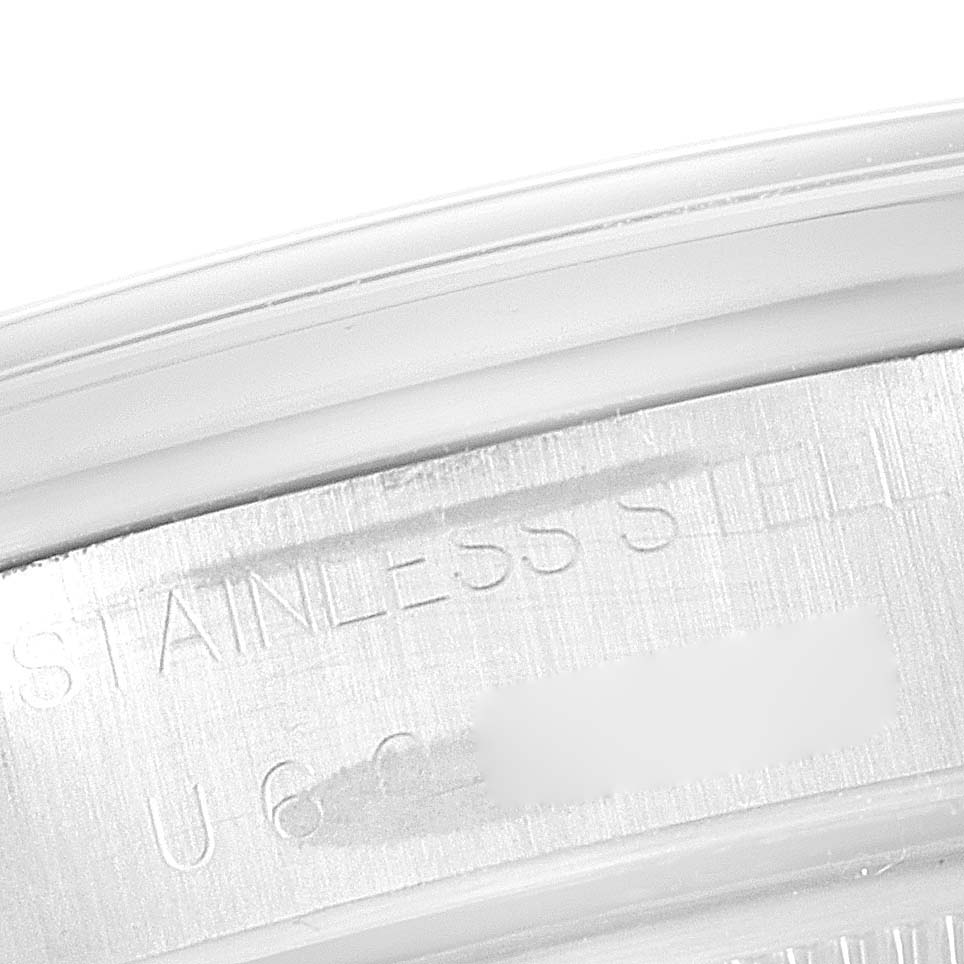 This is a close-up angle of a Rolex Air-King 14000 Men's Stainless Steel Blue Dial 14000 Men's Stainless Steel Blue Dial model, focusing on the "Stainless Steel" engraving on the casing.