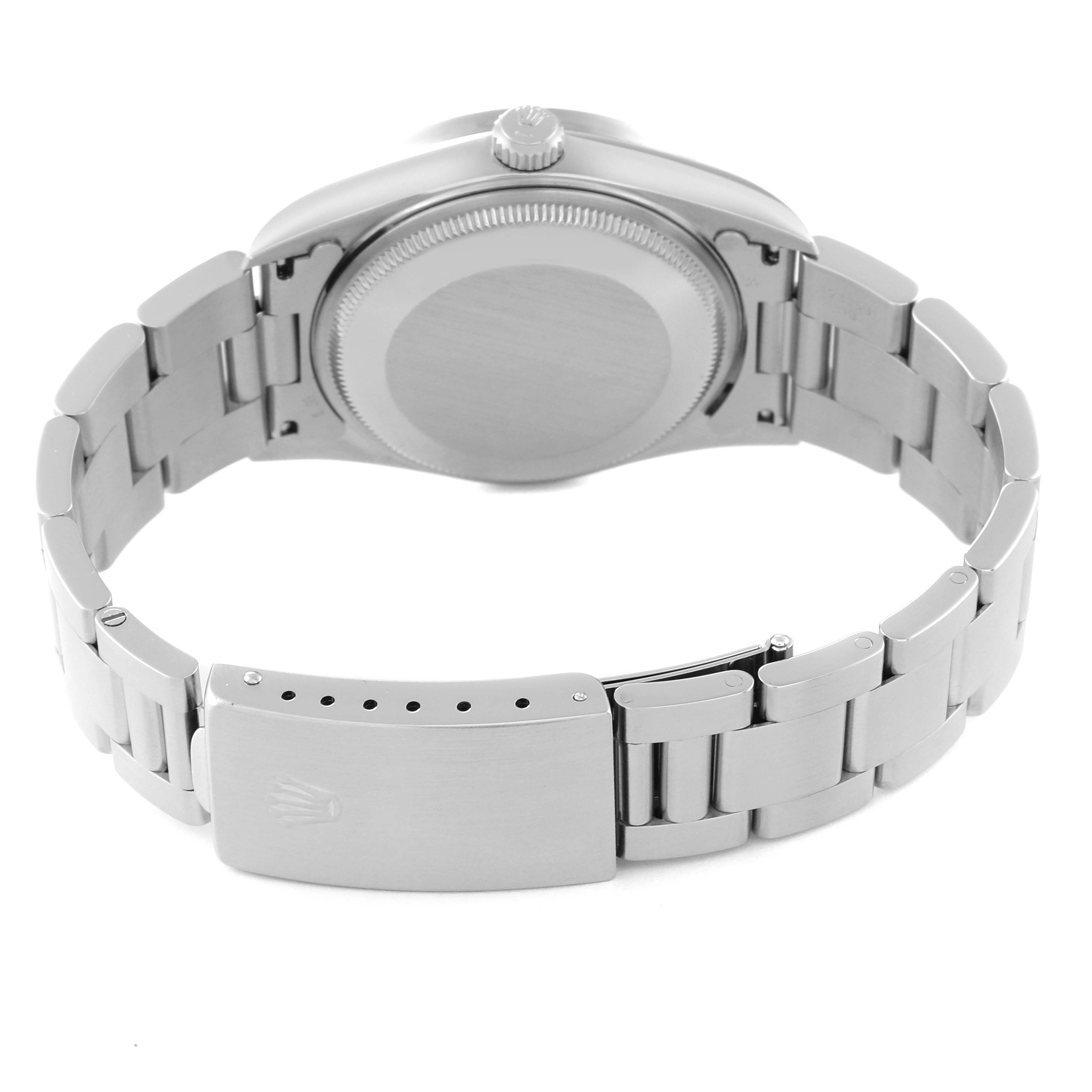 The image shows the back view of a Rolex Air-King 14010 Men's Stainless Steel Pink Dial 14010 Men's Stainless Steel Pink Dial watch with its case back and bracelet clasp visible.