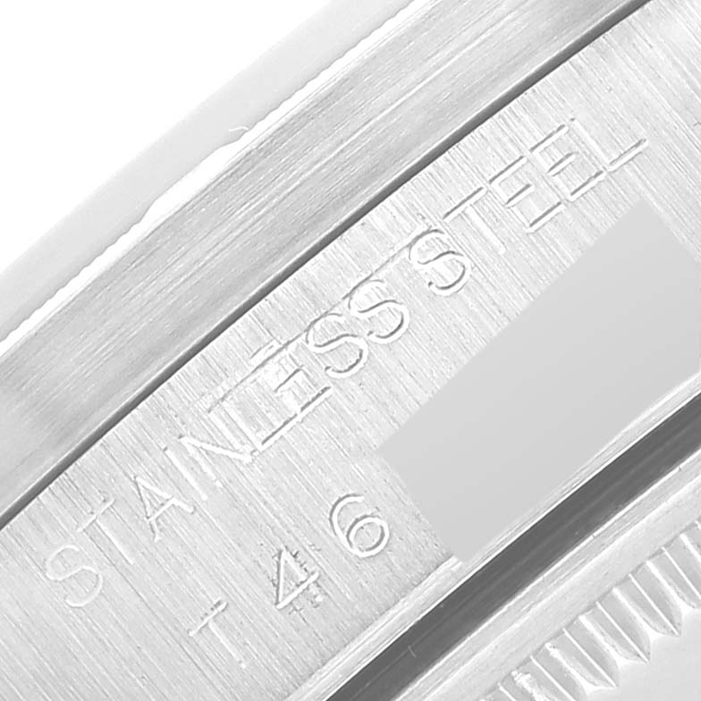 This image shows a close-up angle of a stainless steel part of a Rolex Air-King 14010 Men's Stainless Steel Pink Dial 14010 Men's Stainless Steel Pink Dial watch with engraved markings.