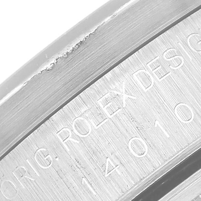 This close-up image shows the engraved text on the side of the Rolex Air-King 14010 Men's Stainless Steel Pink Dial 14010 Men's Stainless Steel Pink Dial watch case.