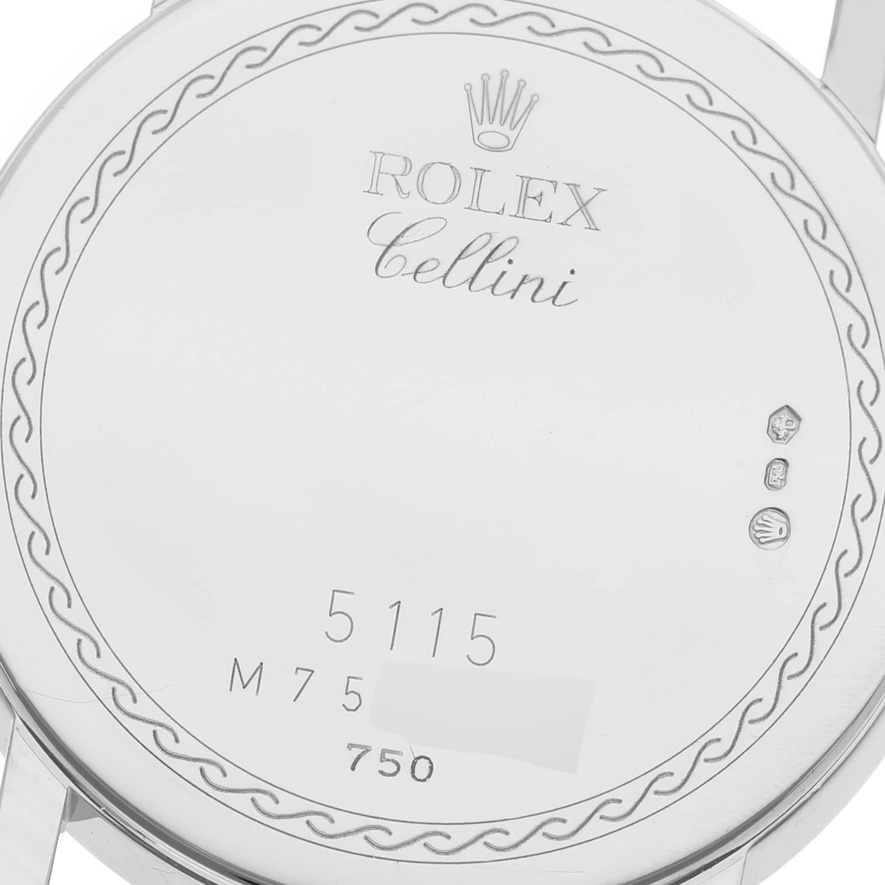This is an image of the back of a Rolex Cellini 5115/9 Men
s White Gold Silver Dial 5115/9 Men
s White Gold Silver Dial watch, featuring the model number and hallmark engravings.