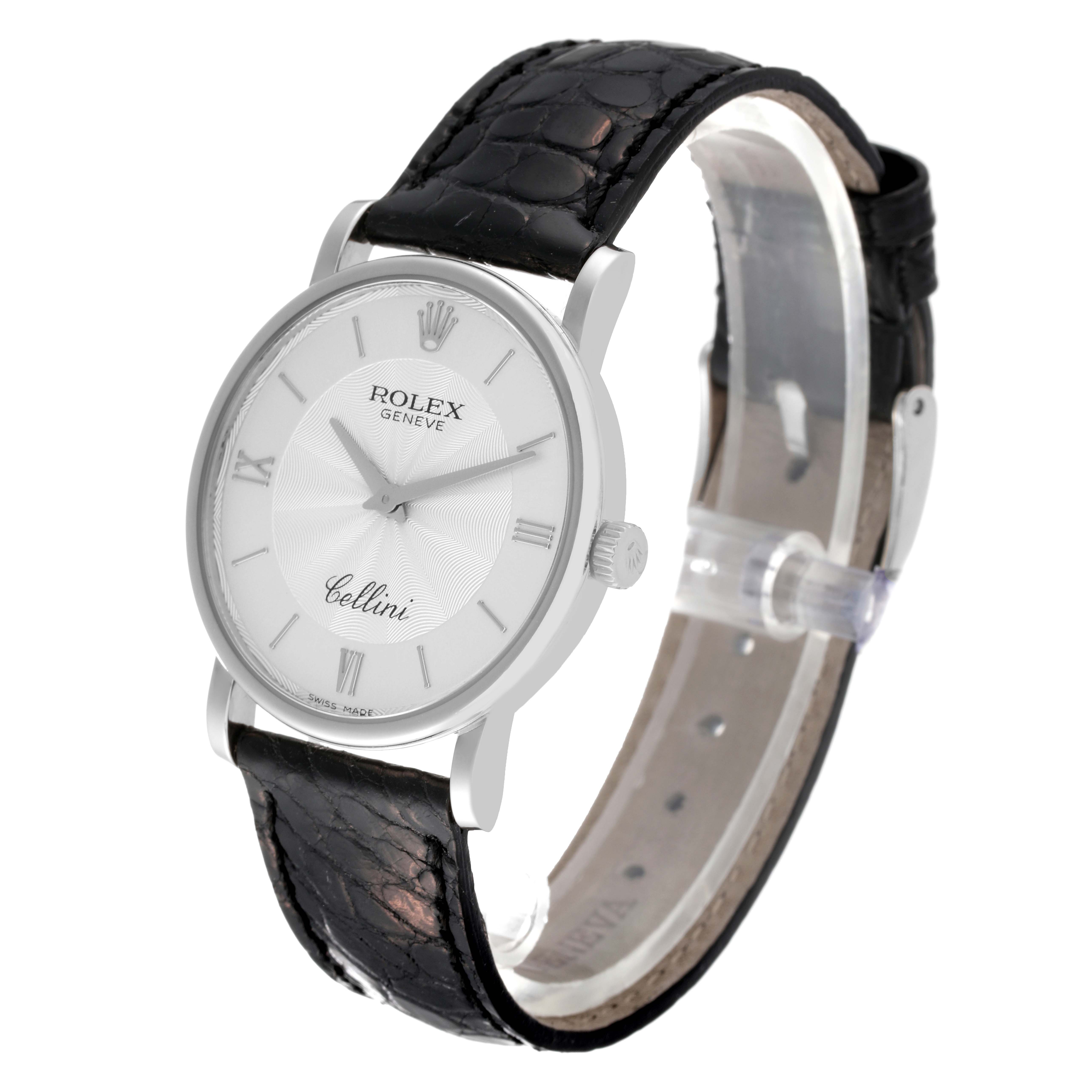 The Rolex Cellini 5115/9 Men
s White Gold Silver Dial 5115/9 Men
s White Gold Silver Dial watch is shown at a slight angle, displaying the face, crown, case, and black leather strap.