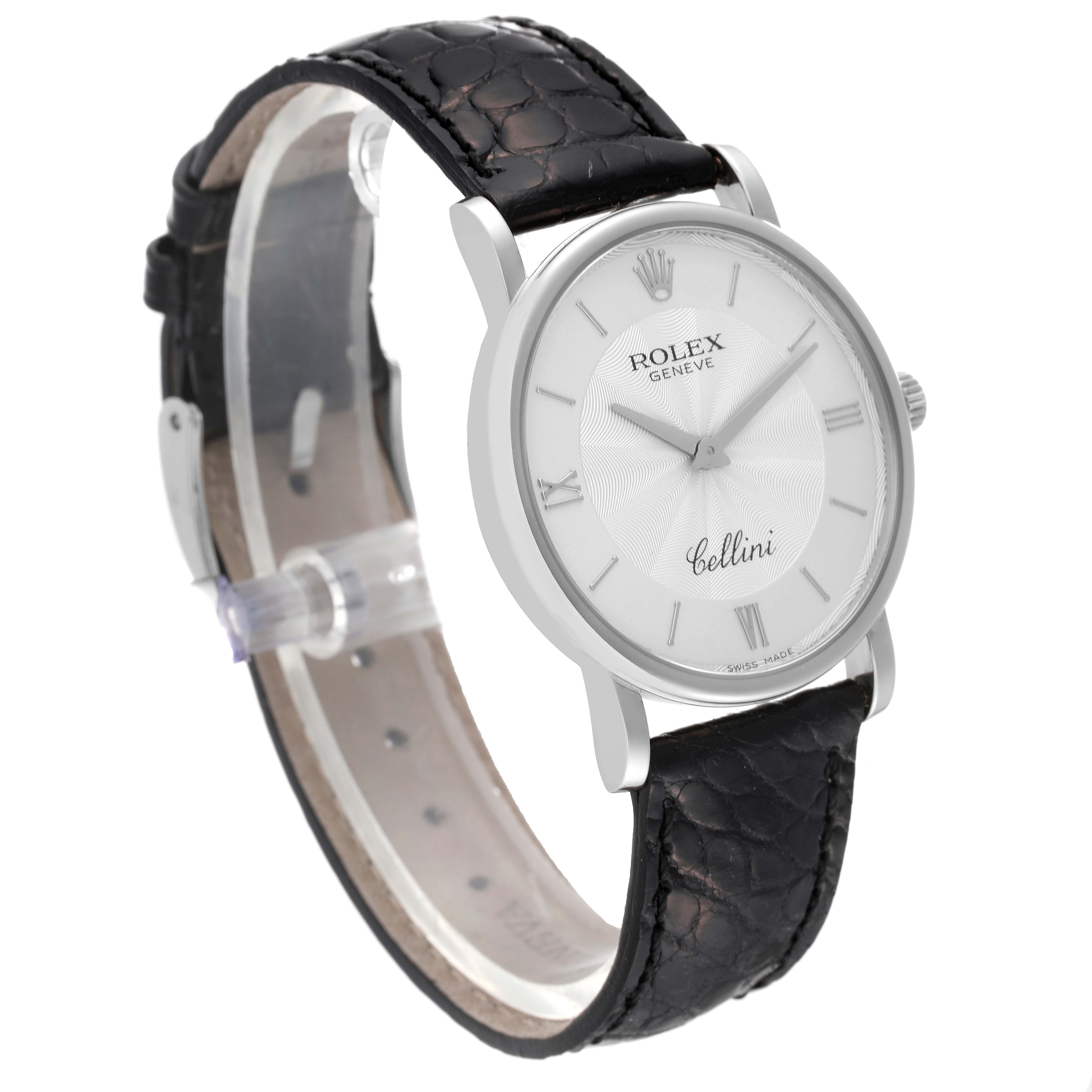 The image shows a Rolex Cellini 5115/9 Men
s White Gold Silver Dial 5115/9 Men
s White Gold Silver Dial watch at a three-quarter angle, highlighting the face, case, crown, and black leather strap.