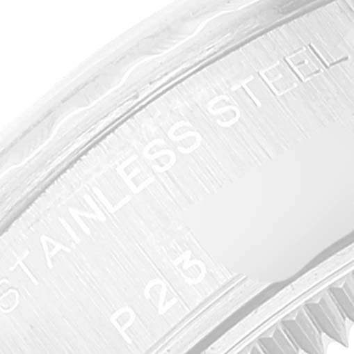 The image shows a close-up of the case back of a Rolex Date 79240 Women's Stainless Steel Blue Dial 79240 Women's Stainless Steel Blue Dial model, highlighting the "STAINLESS STEEL" engraving.
