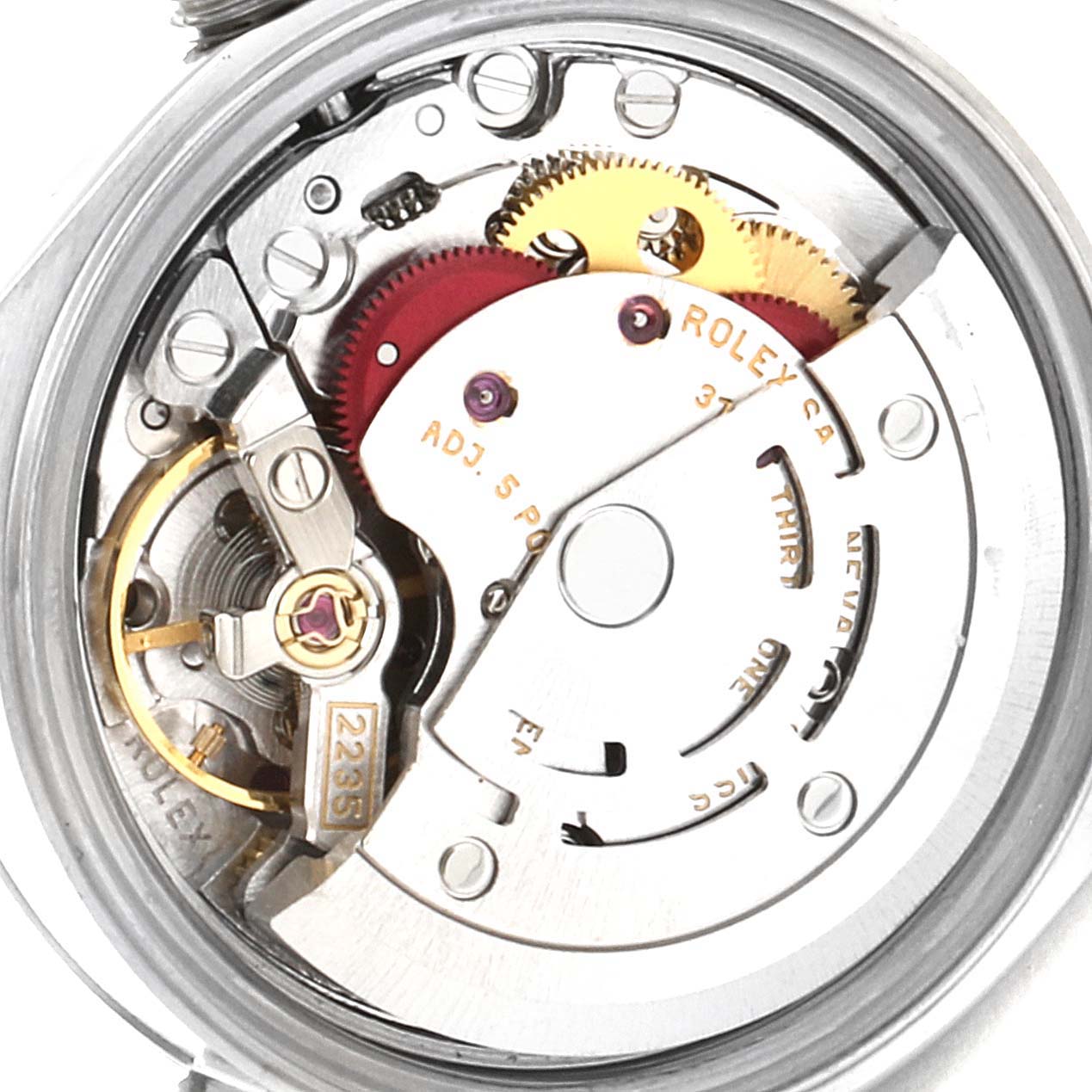 The image shows an inside view of the movement and mechanism components of a Rolex Date 79240 Women
s Stainless Steel Silver Dial 79240 Women
s Stainless Steel Silver Dial model watch.