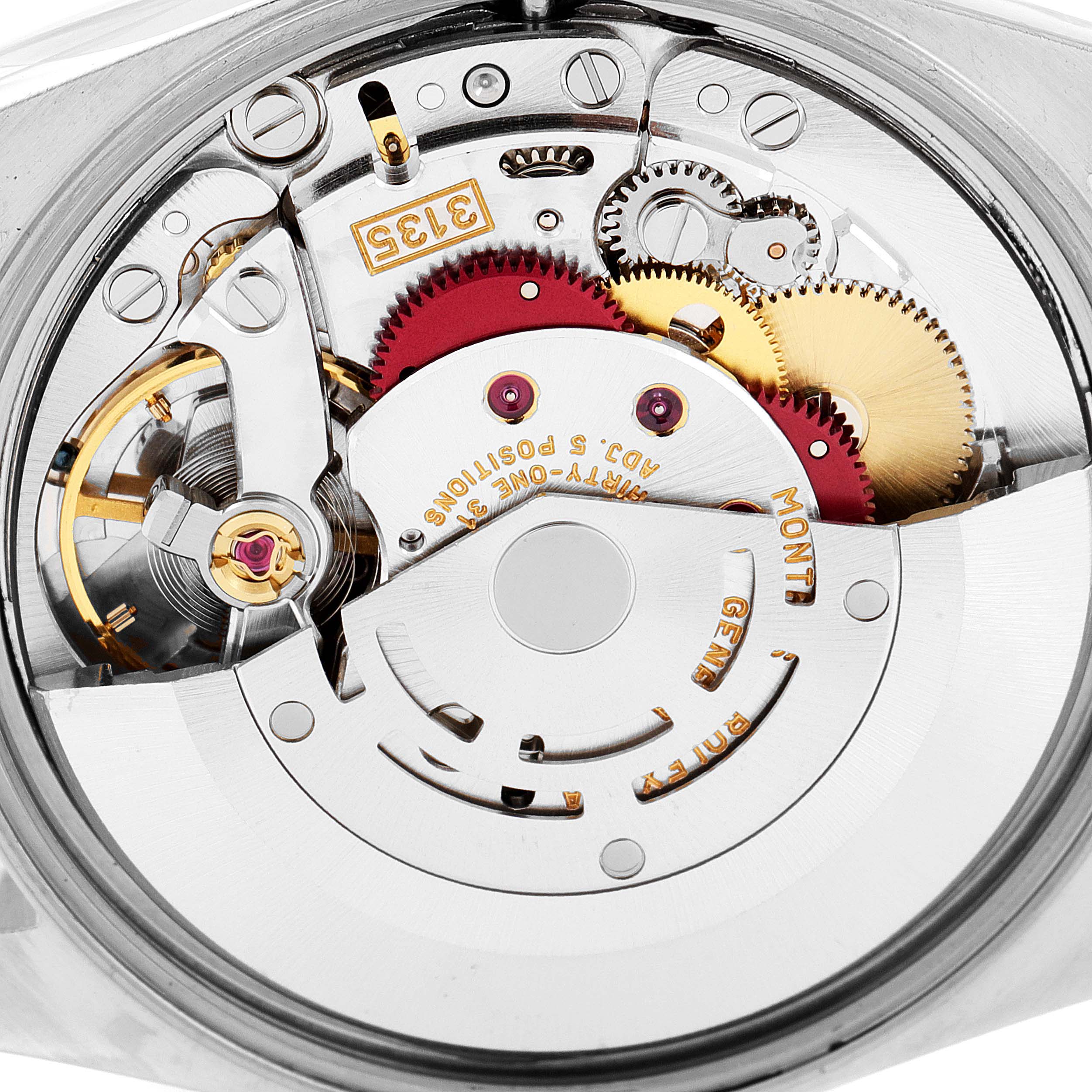 This image shows a close-up of the movement mechanism of a Rolex Date 15203 Men's Steel and Gold (two tone) White Dial 15203 Men's Steel and Gold (two tone) White Dial model watch from a rear angle.
