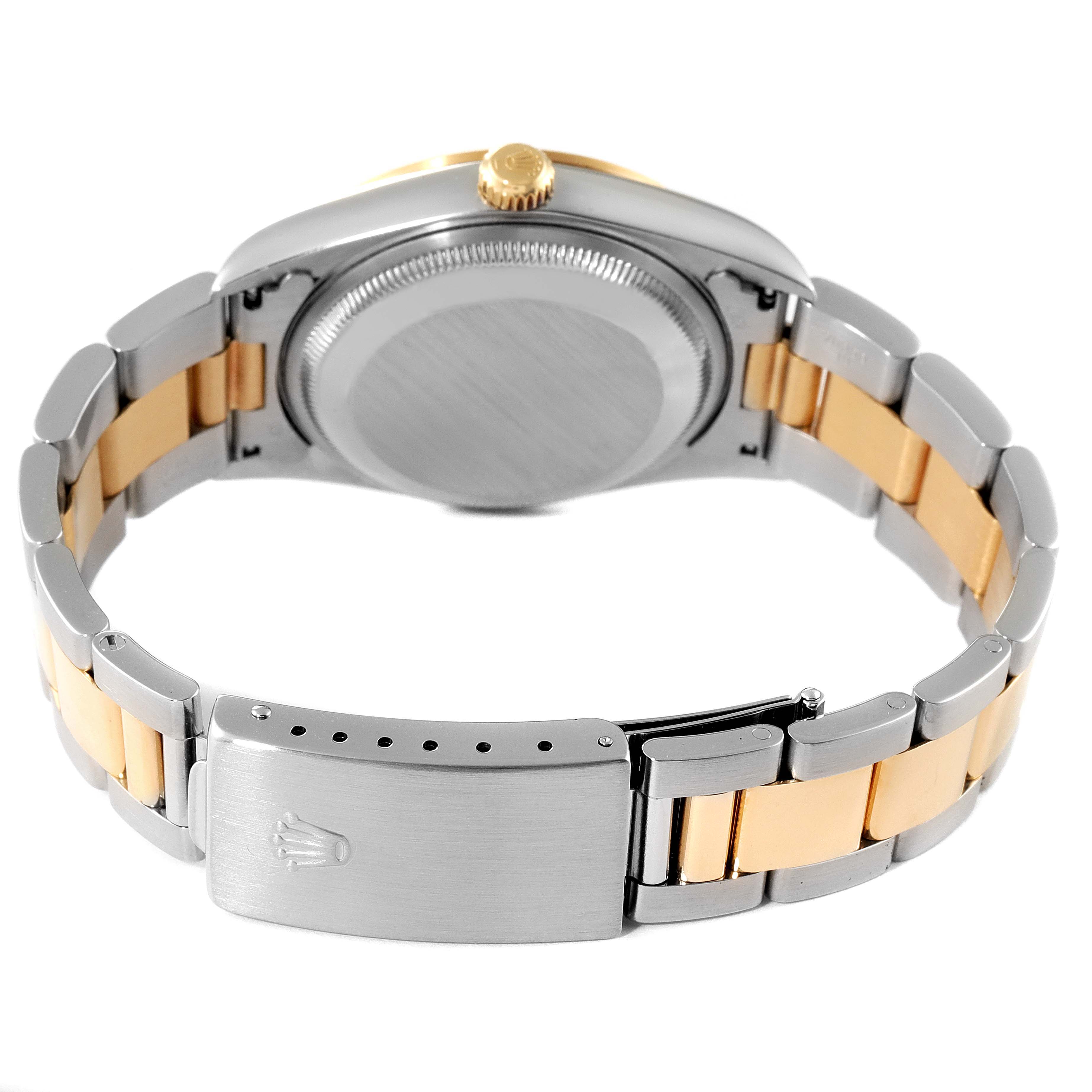 This image shows the back case, crown, and bracelet of a Rolex Date 15203 Men's Steel and Gold (two tone) White Dial 15203 Men's Steel and Gold (two tone) White Dial model watch.