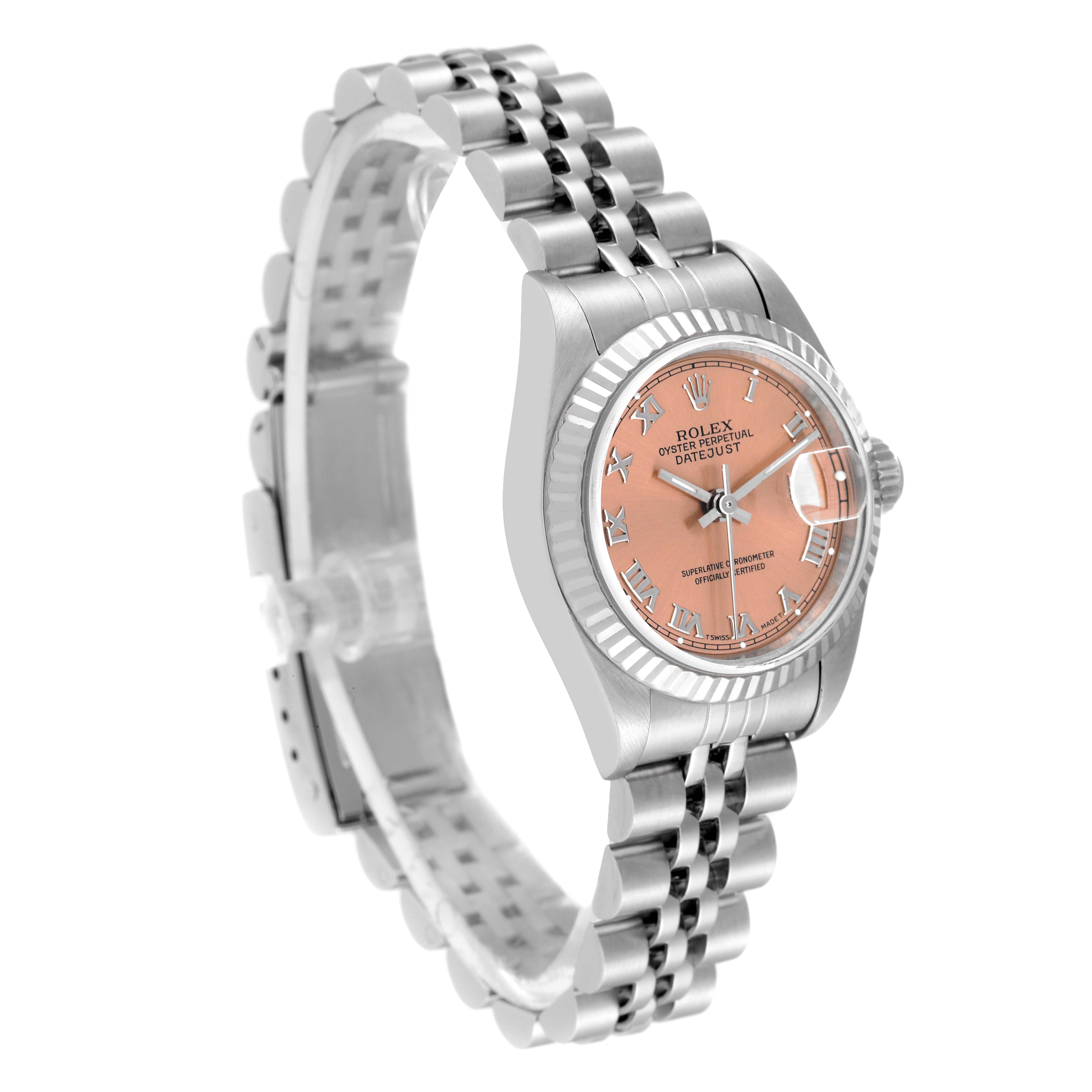 This image shows a Rolex Datejust 69174 Women's Stainless Steel Pink Dial 69174 Women's Stainless Steel Pink Dial watch with a pink dial, Jubilee bracelet, and fluted bezel at an angled side view.