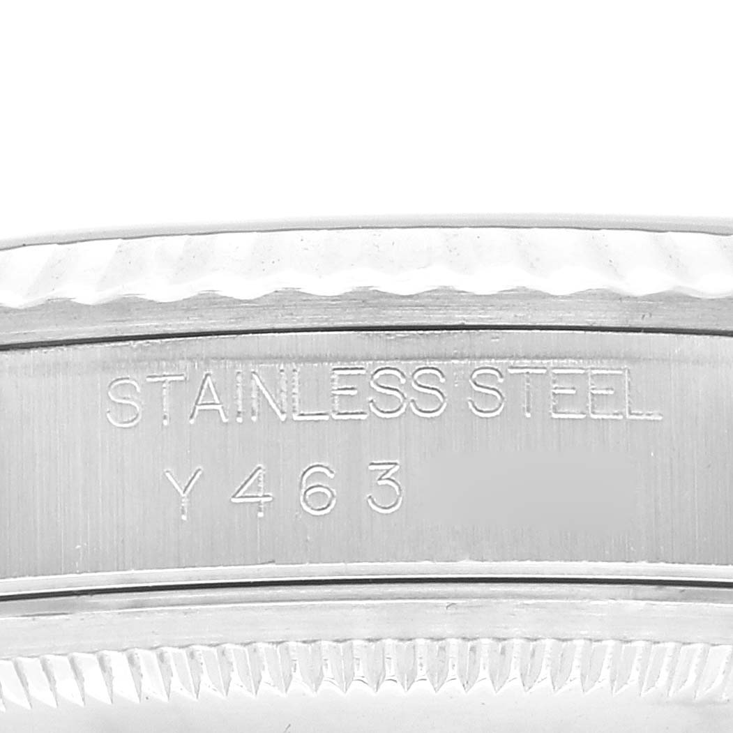 The image shows the side view of a Rolex Datejust 16234 Men's Stainless Steel Blue Dial 16234 Men's Stainless Steel Blue Dial model's case with the stainless steel engraving and serial number.