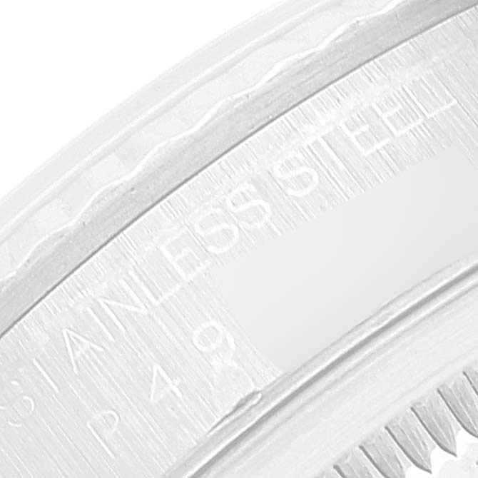 This image shows a close-up of the bezel and the stainless steel engraving on a Rolex Datejust 16234 Men's Stainless Steel Blue Dial 16234 Men's Stainless Steel Blue Dial watch.