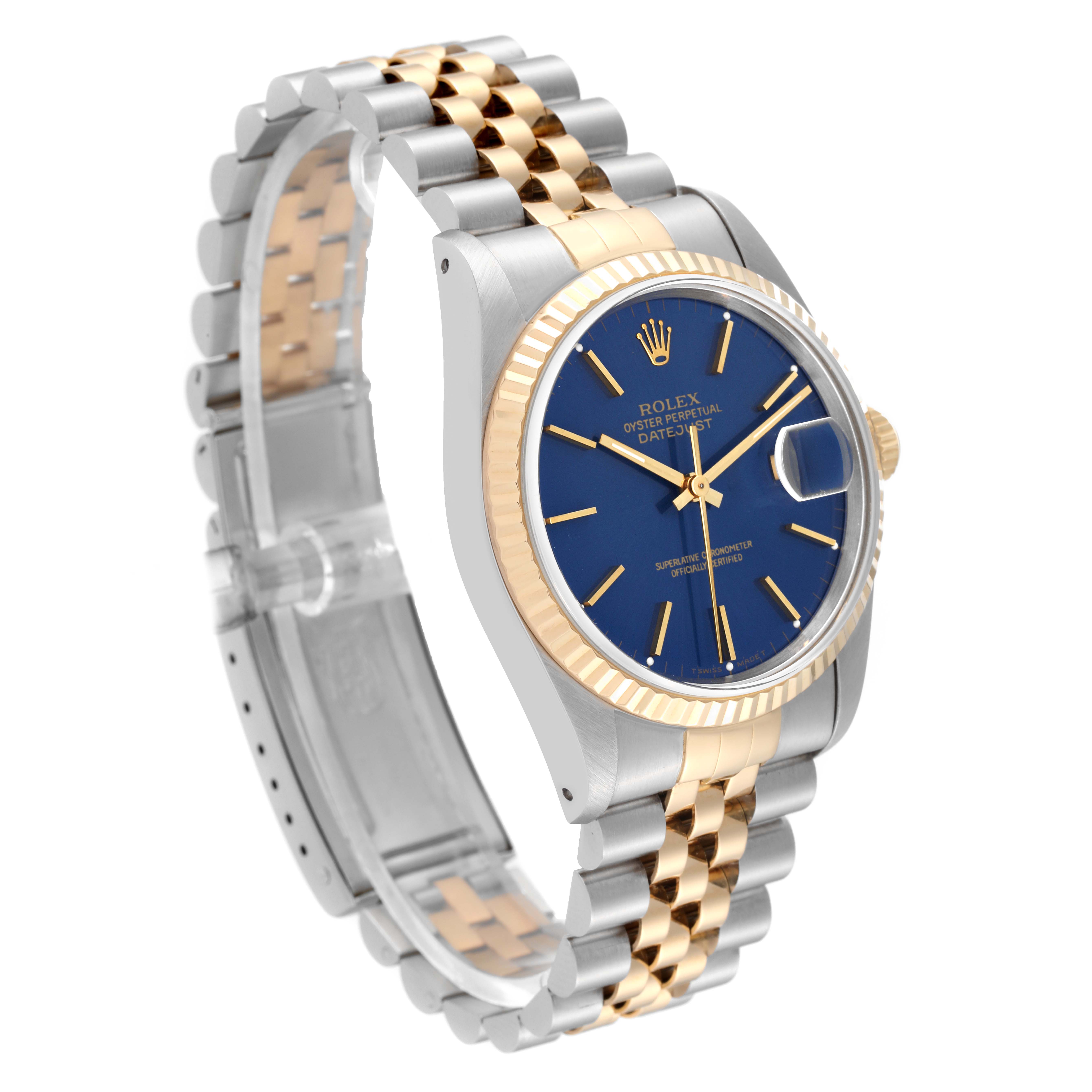 This angled view of the Rolex Datejust 16233 Men's Steel and Gold (two tone) Blue Dial 16233 Men's Steel and Gold (two tone) Blue Dial watch shows the dial, bezel, case, and bracelet.