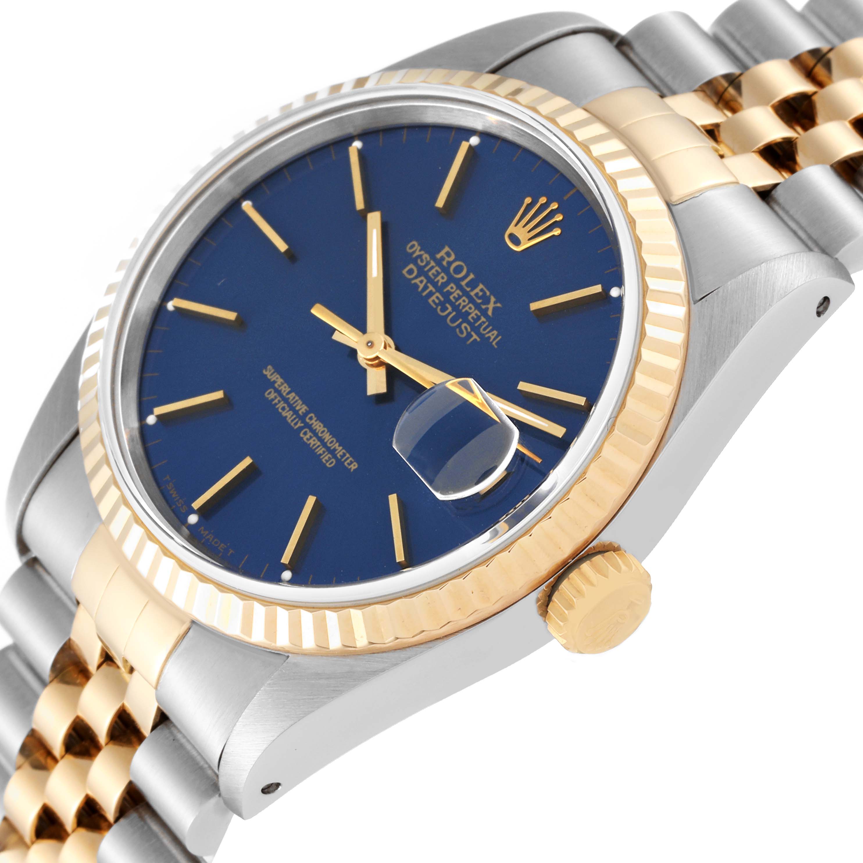 The image shows a Rolex Datejust 16233 Men's Steel and Gold (two tone) Blue Dial 16233 Men's Steel and Gold (two tone) Blue Dial watch at an angled view, highlighting the bezel, crown, bracelet, and blue dial with gold accents.