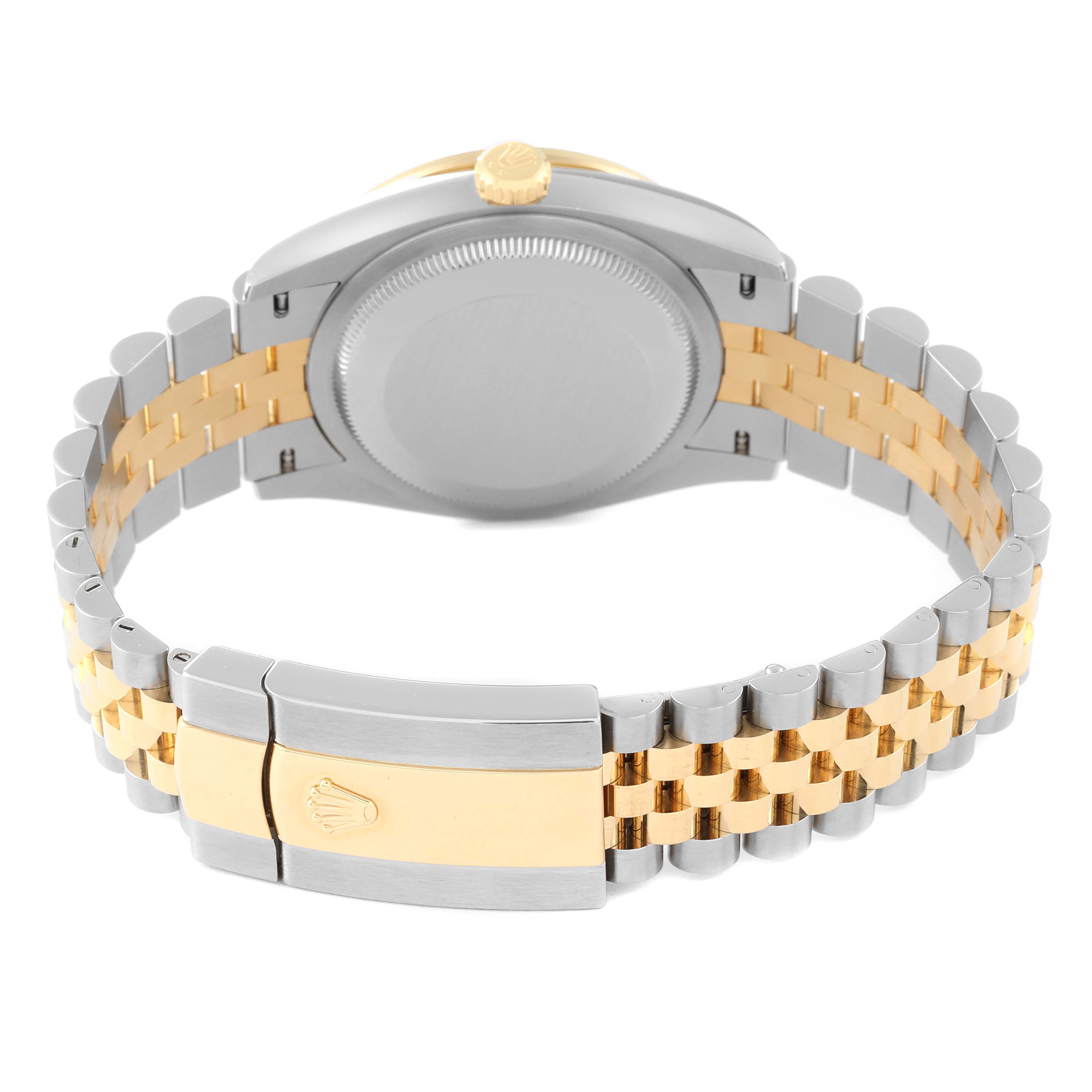 This image shows the back case and metal bracelet of the Rolex Datejust 126283 Men's Steel and Gold (two tone) Silver Dial 126283 Men's Steel and Gold (two tone) Silver Dial watch.