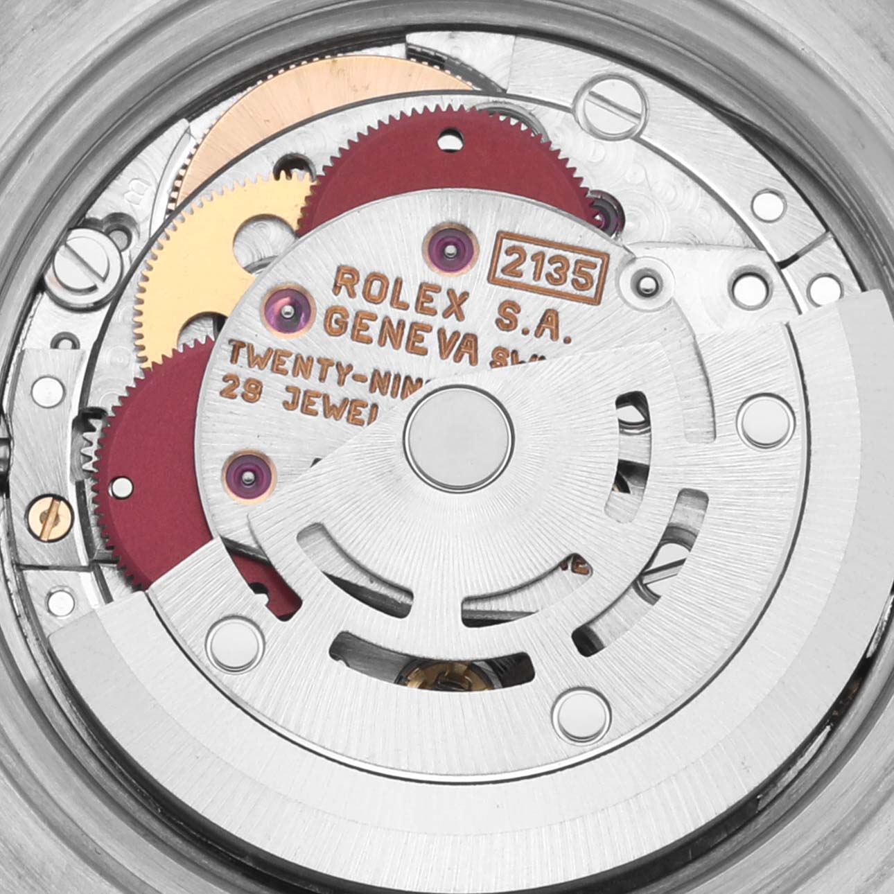 This image shows the intricate movement mechanism of a Rolex Datejust 69173 Women's Steel and Gold (two tone) Champagne Dial 69173 Women's Steel and Gold (two tone) Champagne Dial watch from a top-down angle.