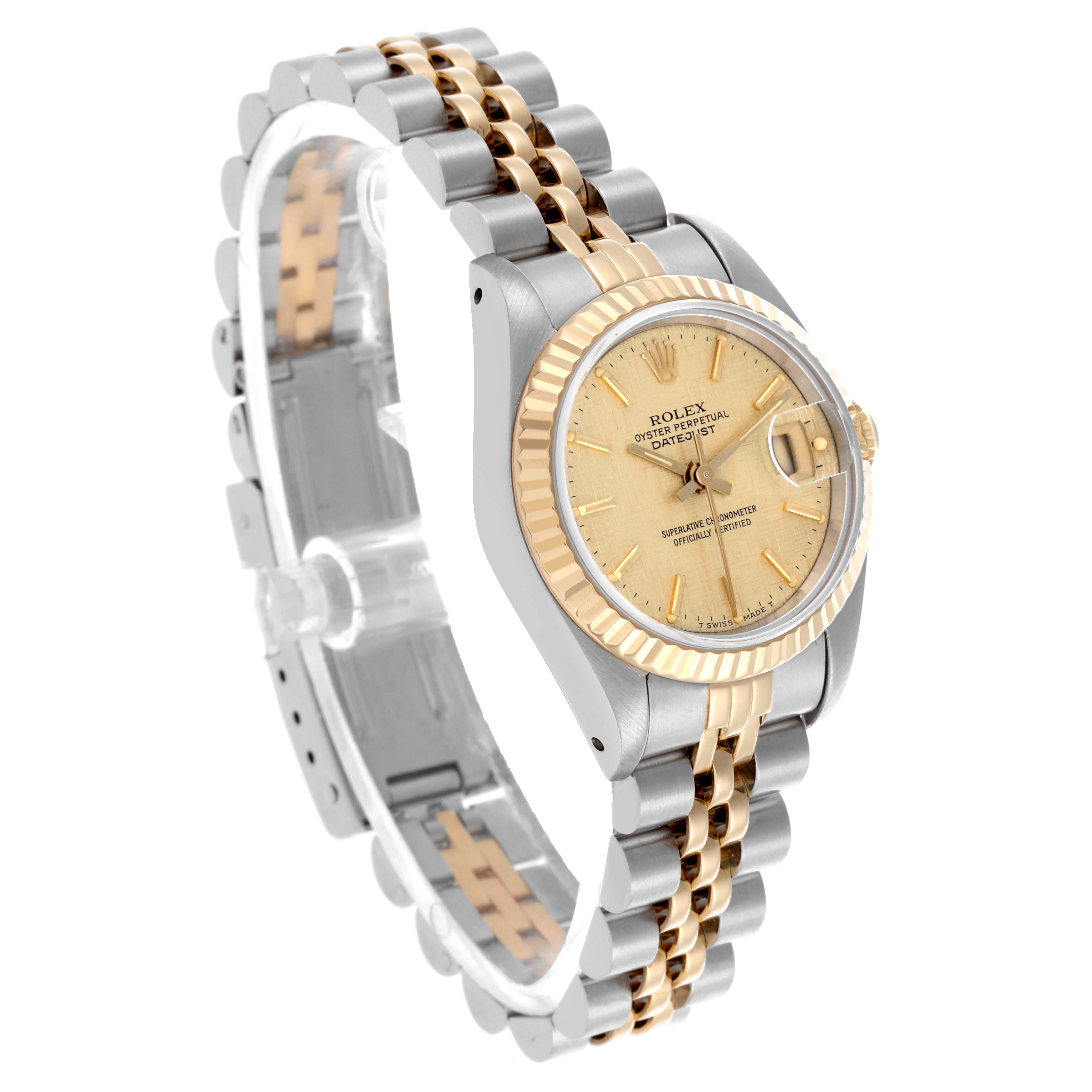 The image shows a Rolex Datejust 69173 Women's Steel and Gold (two tone) Champagne Dial 69173 Women's Steel and Gold (two tone) Champagne Dial at a three-quarter angle, highlighting the dial, case, fluted bezel, and two-tone bracelet.