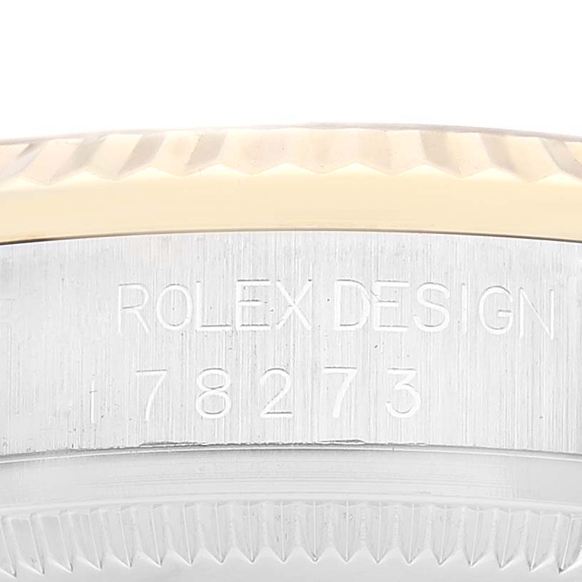 This is a close-up shot of a mid-size Rolex watch, showing the model number "78273" and part of the bezel.