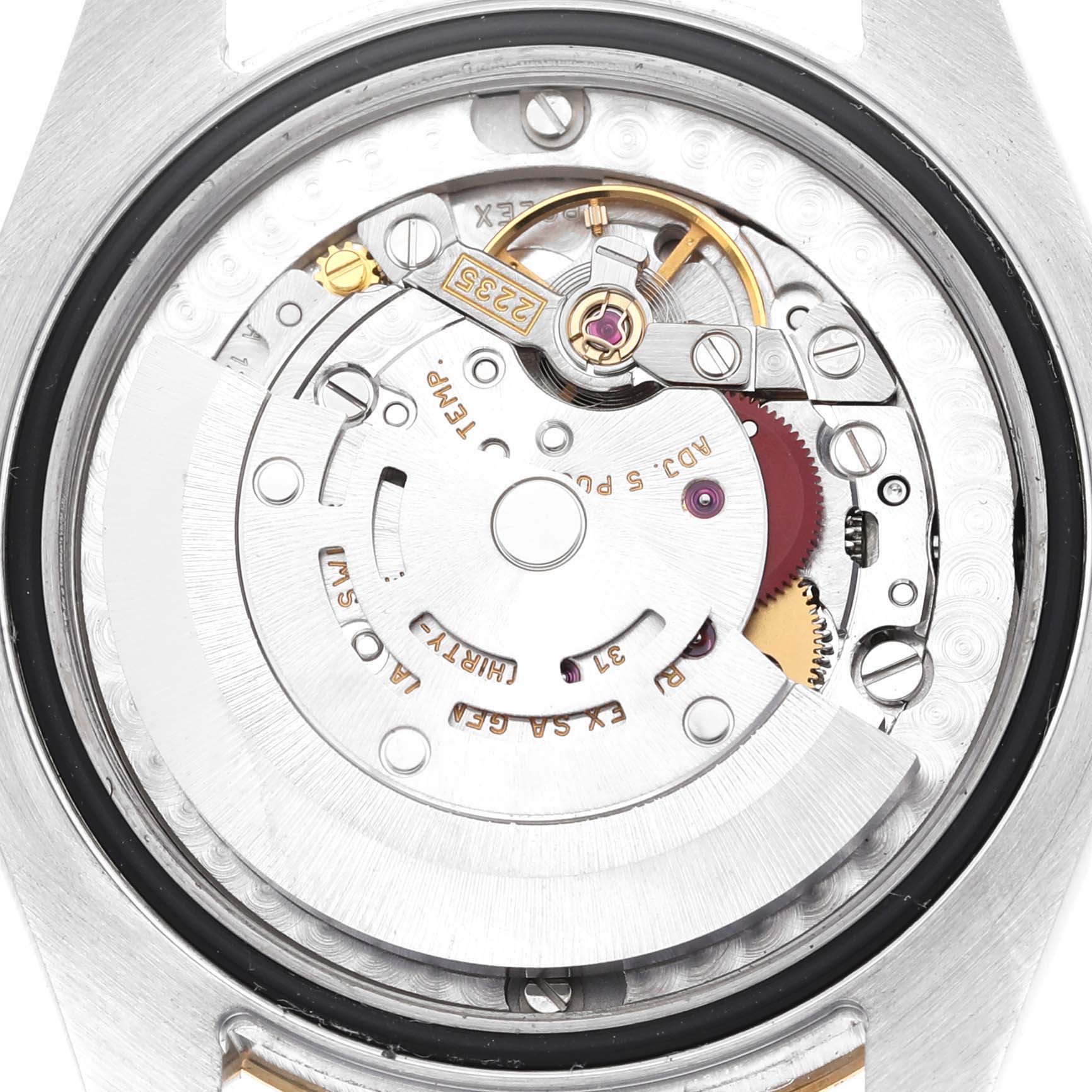 This image shows the internal movement and mechanism of a Mid-Size Rolex watch from a back-case angle.